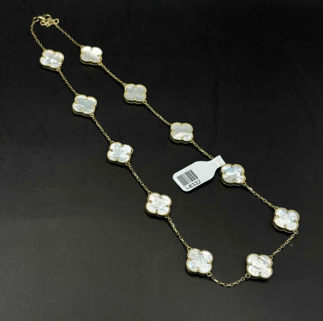 14k Yellow Gold Mother of Pearl Clover Necklace: A Timeless Elegance