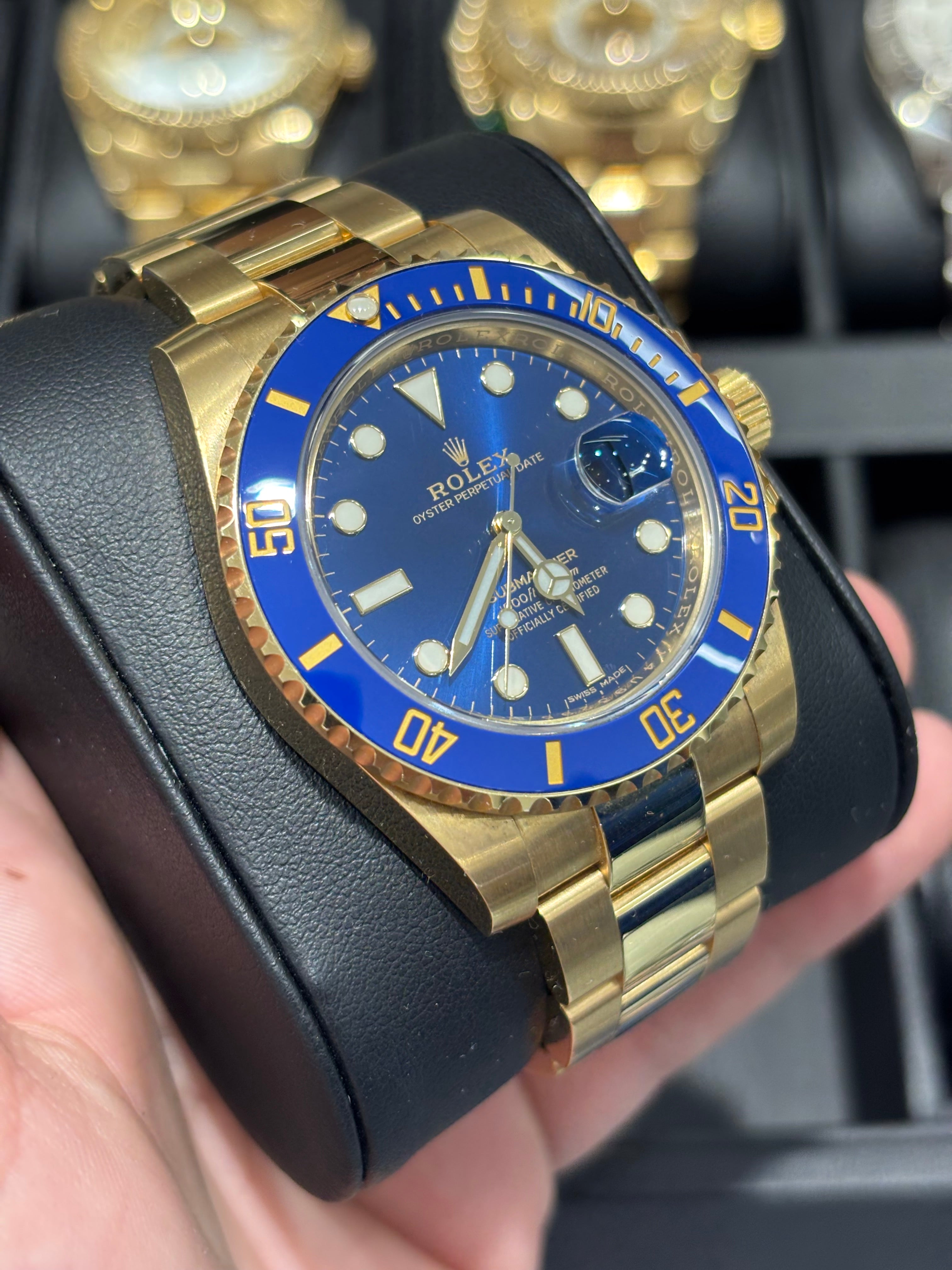 ROLEX SUBMARINER 40MM | 18KT GOLD | OYSTER BRACELET | BLUE DIAL