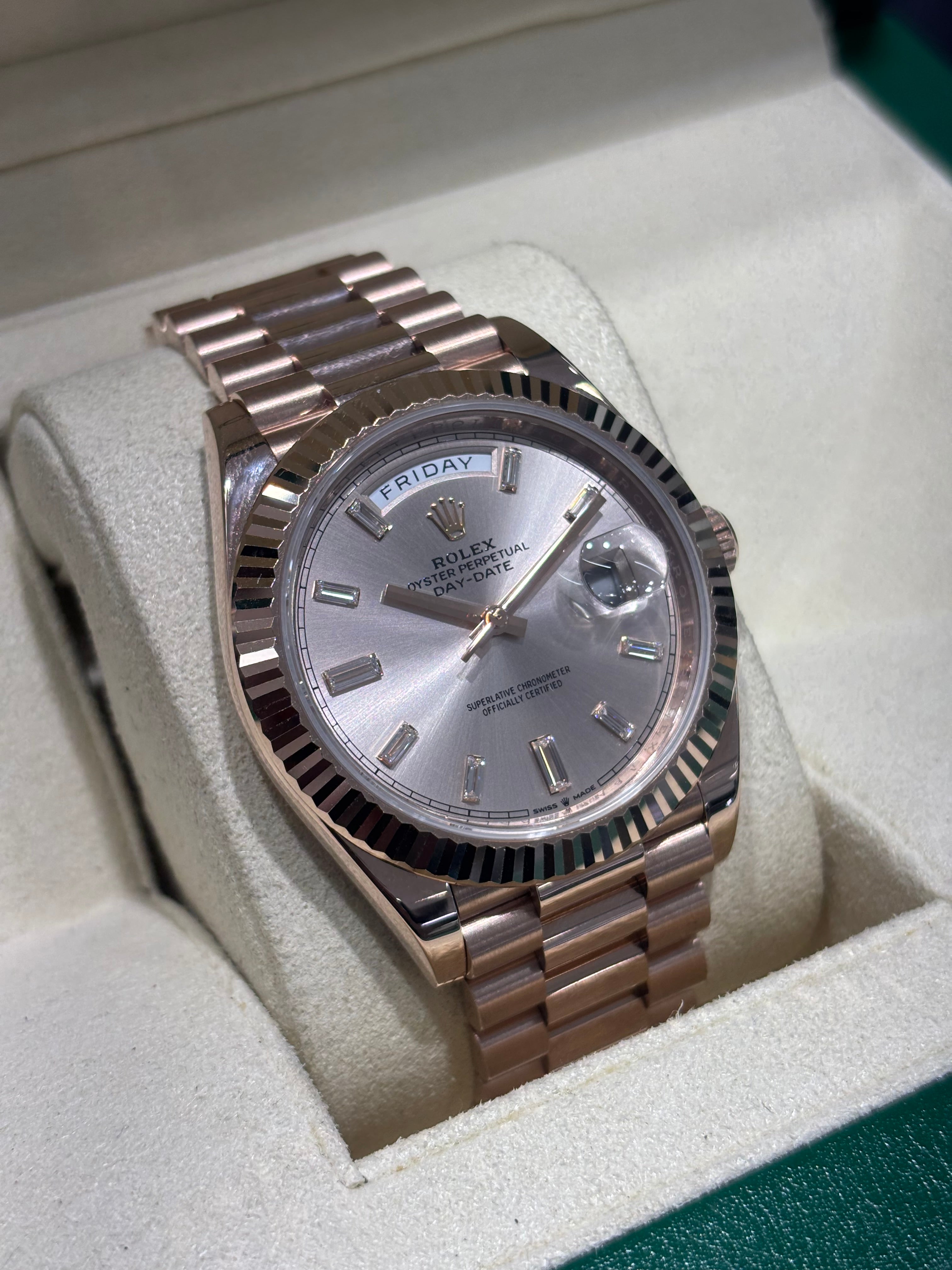 40MM ROLEX DAY-DATE Ref. 228235 | 18KT ROSE GOLD | SUNDUST BAGUETTE DIAL |
