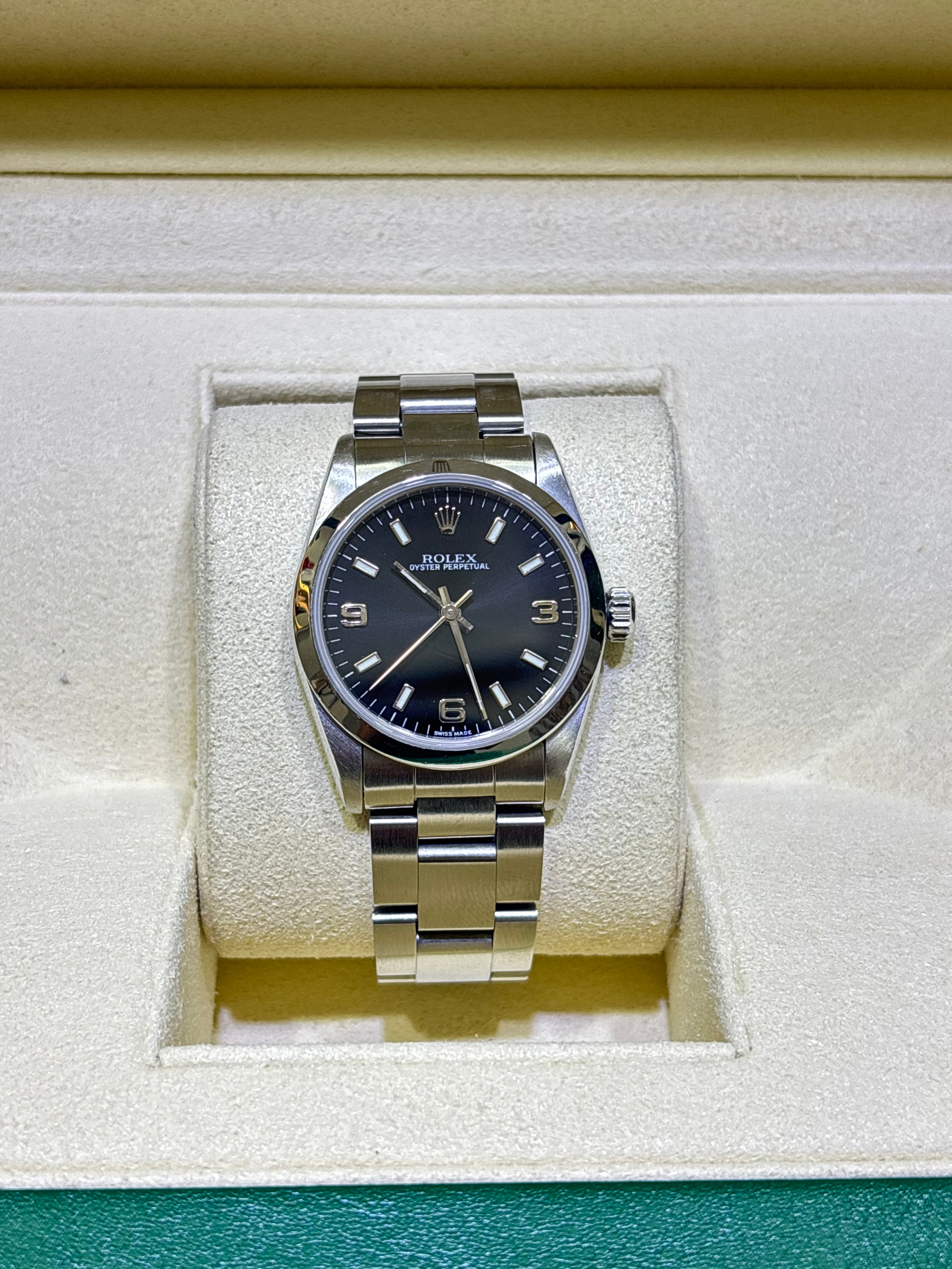 ROLEX OYSTER PERPETUAL | 31MM STEEL | BLACK DIAL