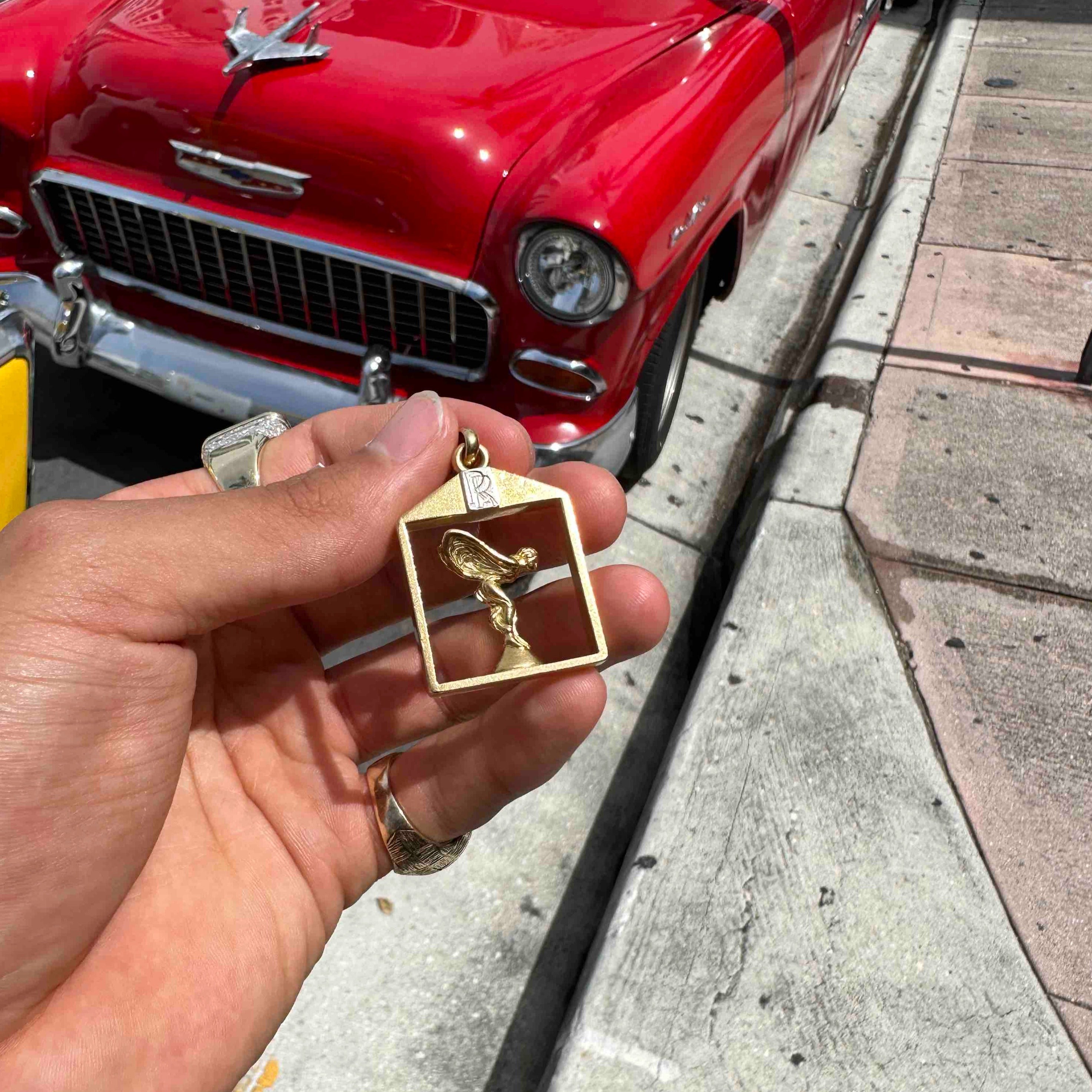 18k Rolls Royce Gold Pendant cuban link