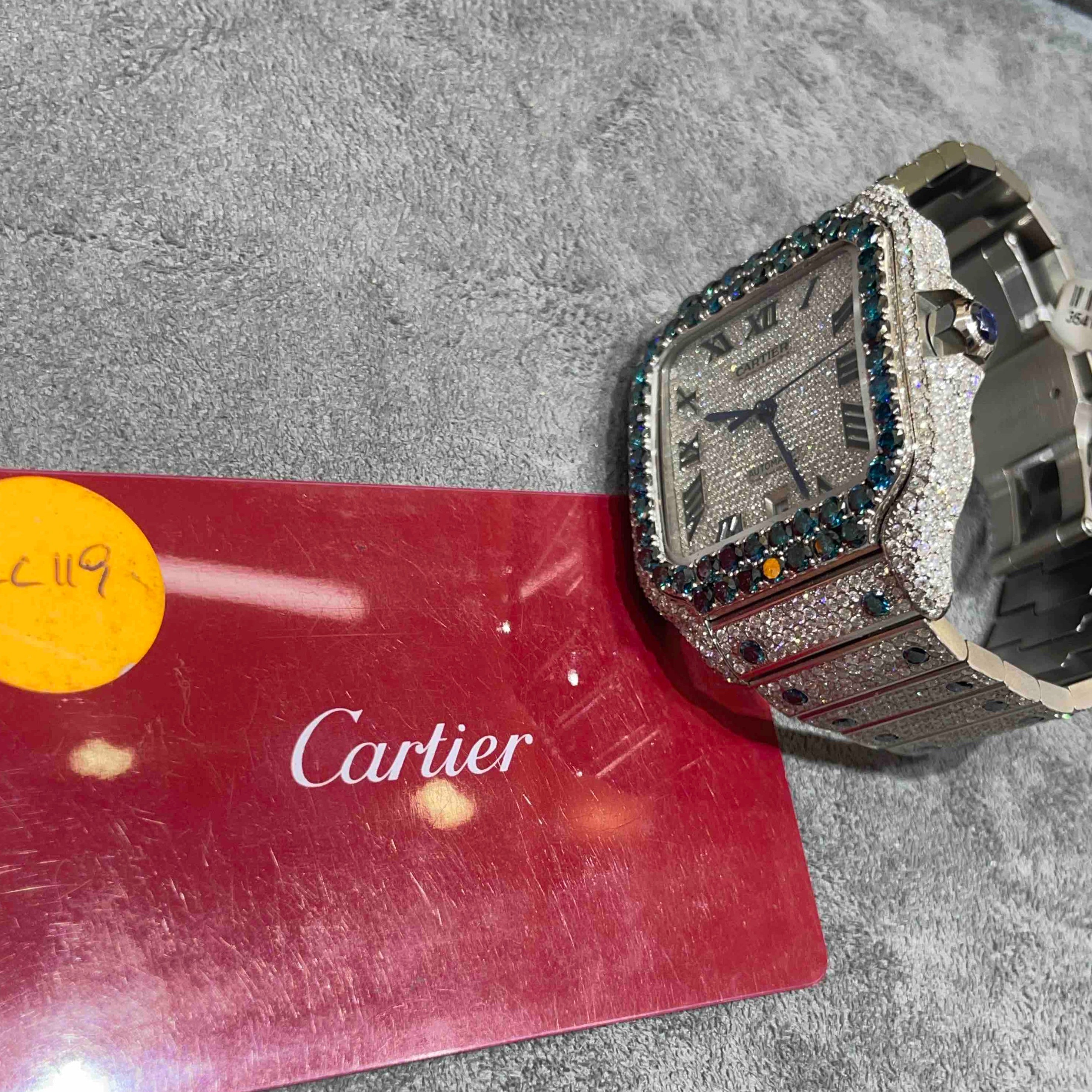 SAPPHIRE ICED OUT CARTIER WATCH
