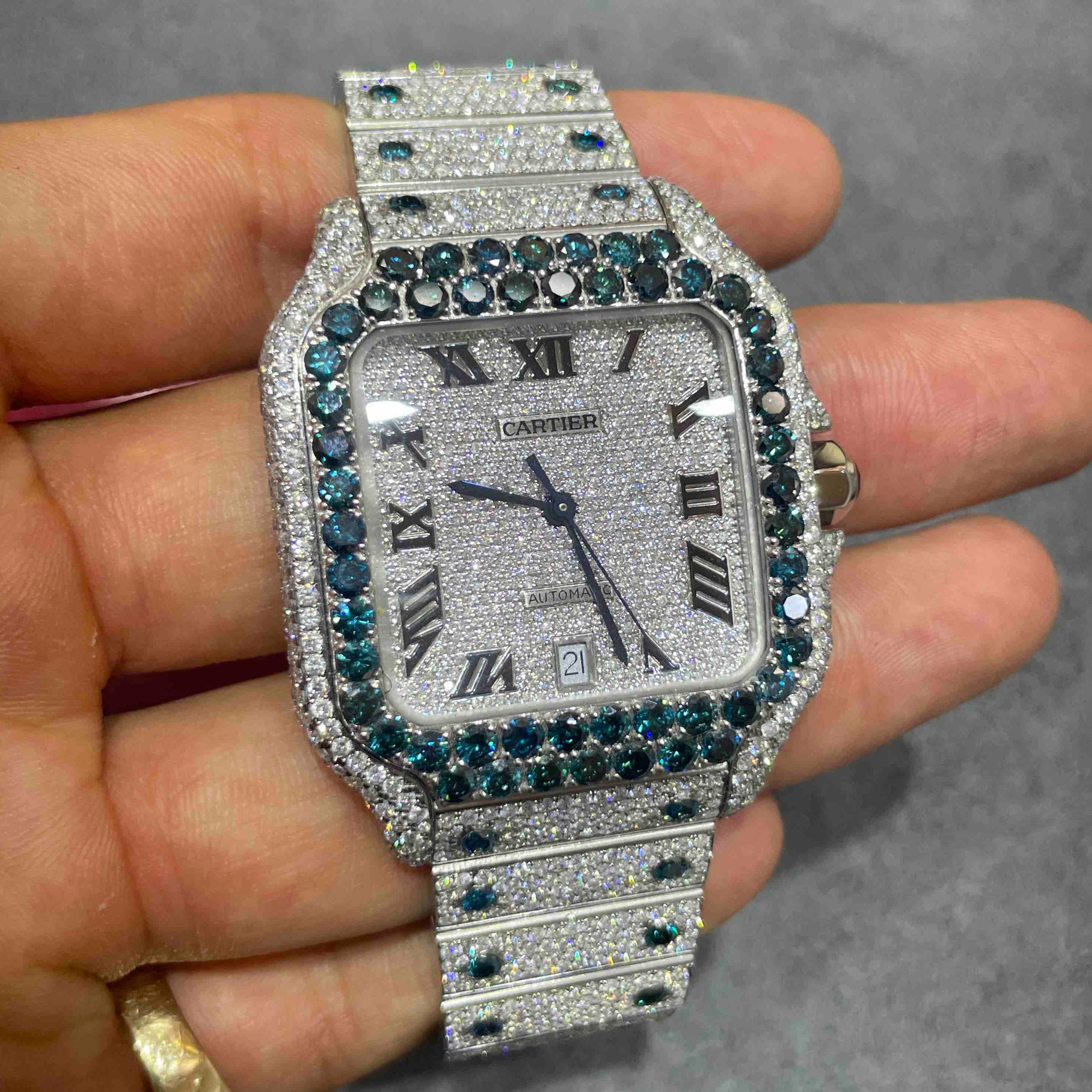 SAPPHIRE ICED OUT CARTIER WATCH