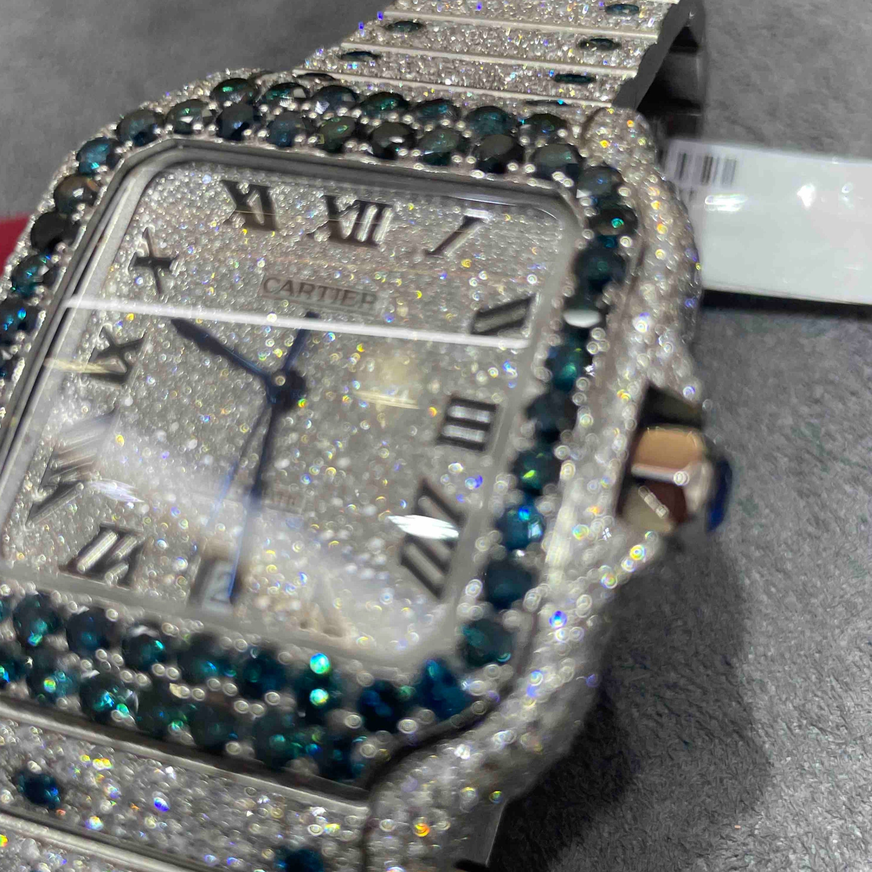 SAPPHIRE ICED OUT CARTIER WATCH