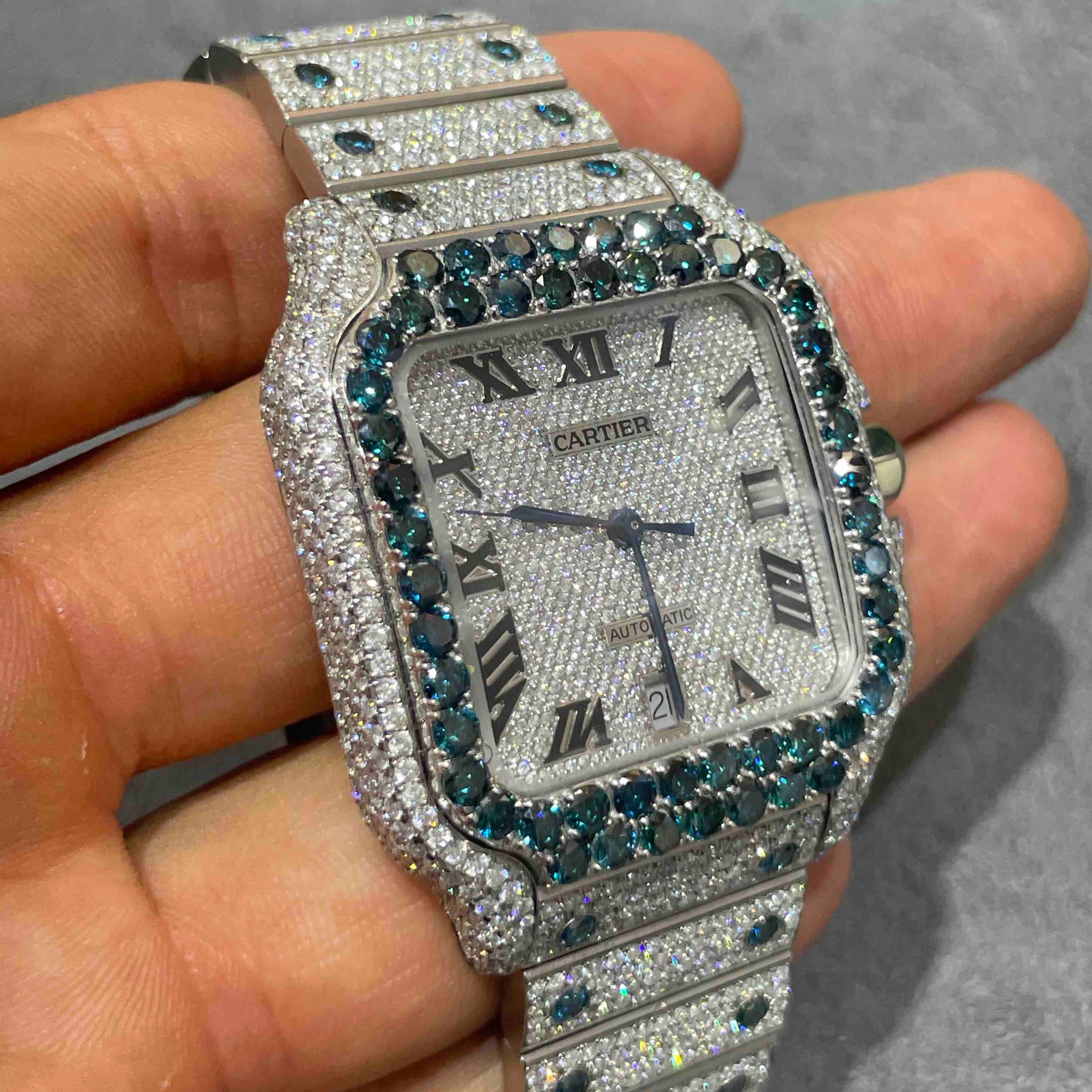 SAPPHIRE ICED OUT CARTIER WATCH