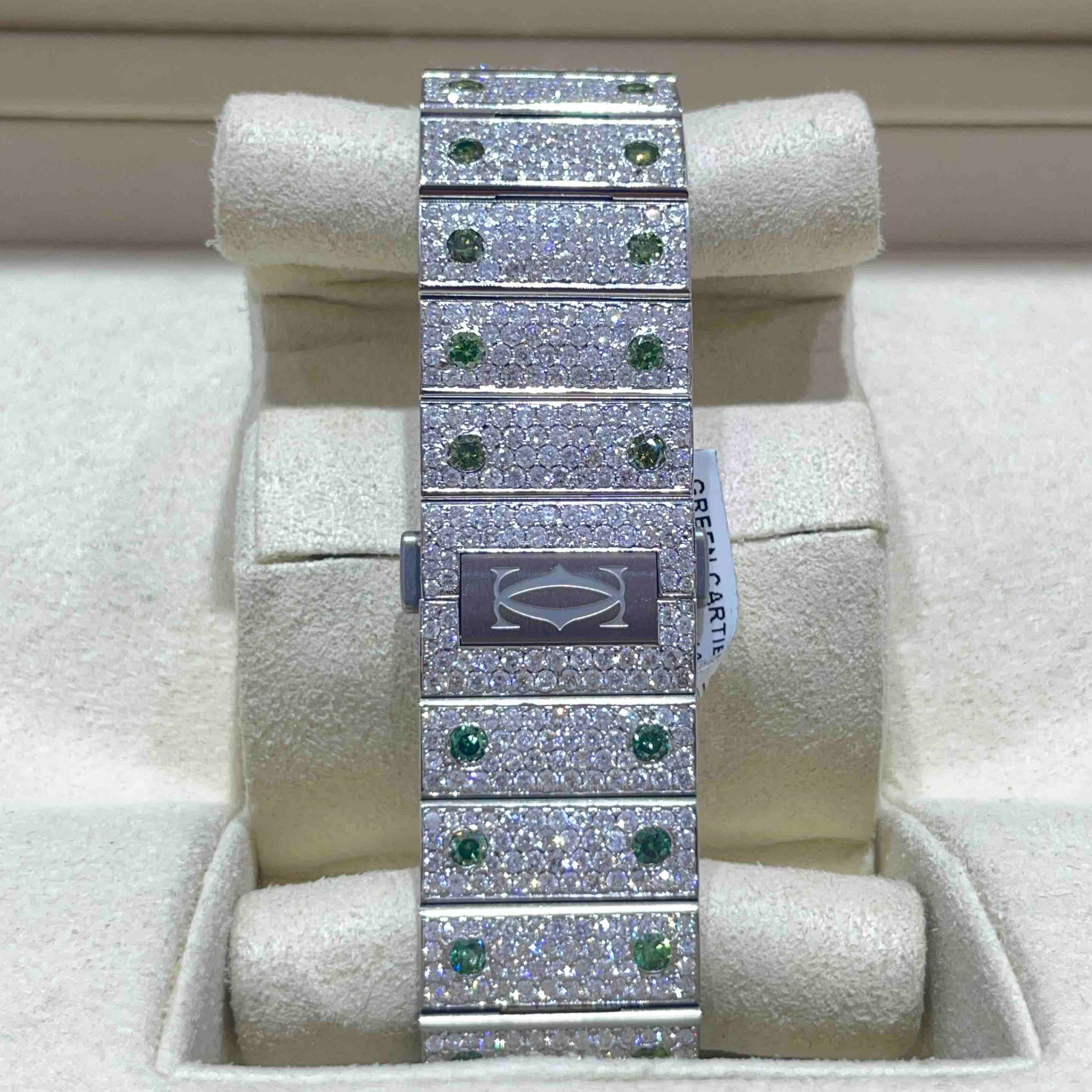 EMERALD ICED OUT CARTIER WATCH