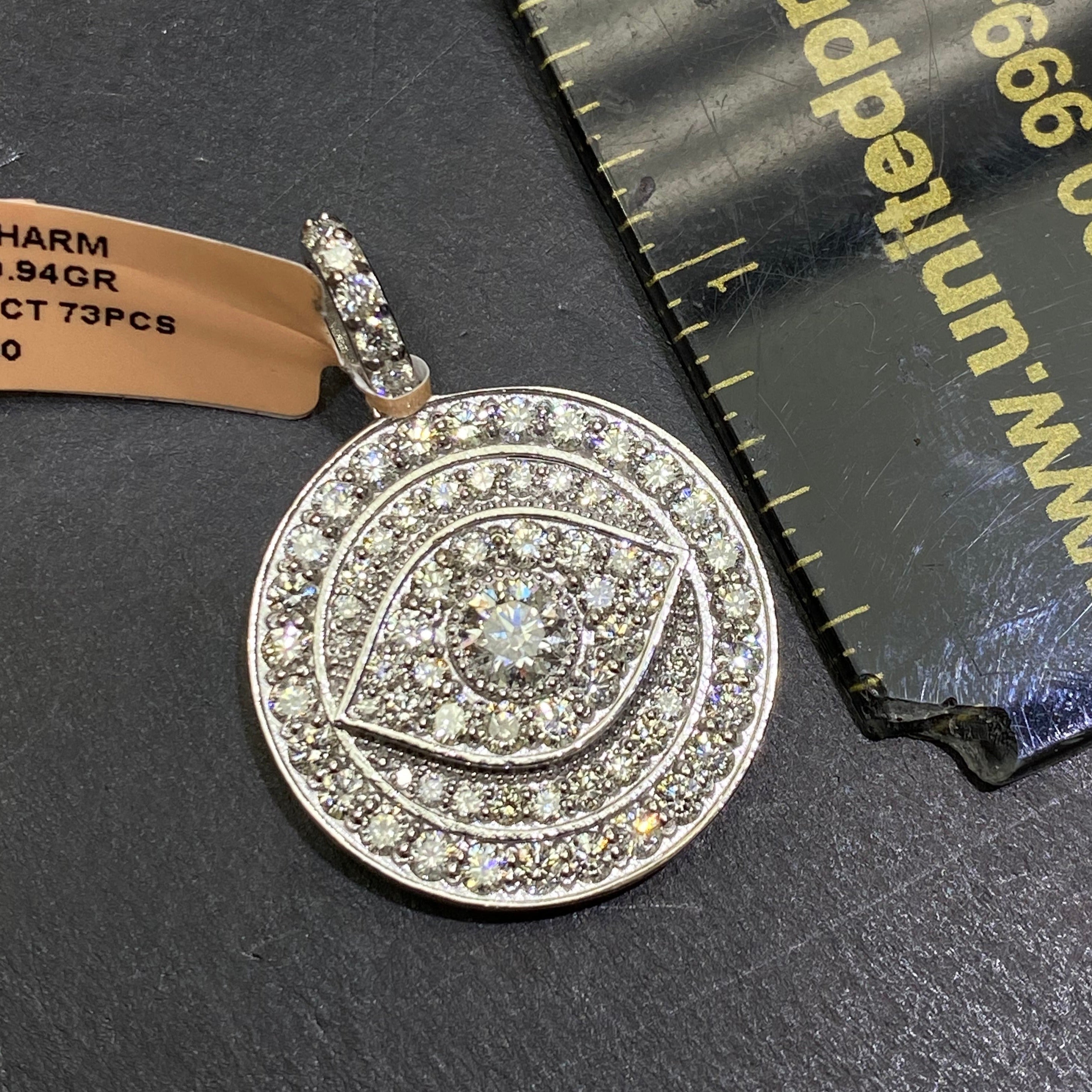 New14k “iced” 4cts Vs1 .50 carat center stone Eye pendant