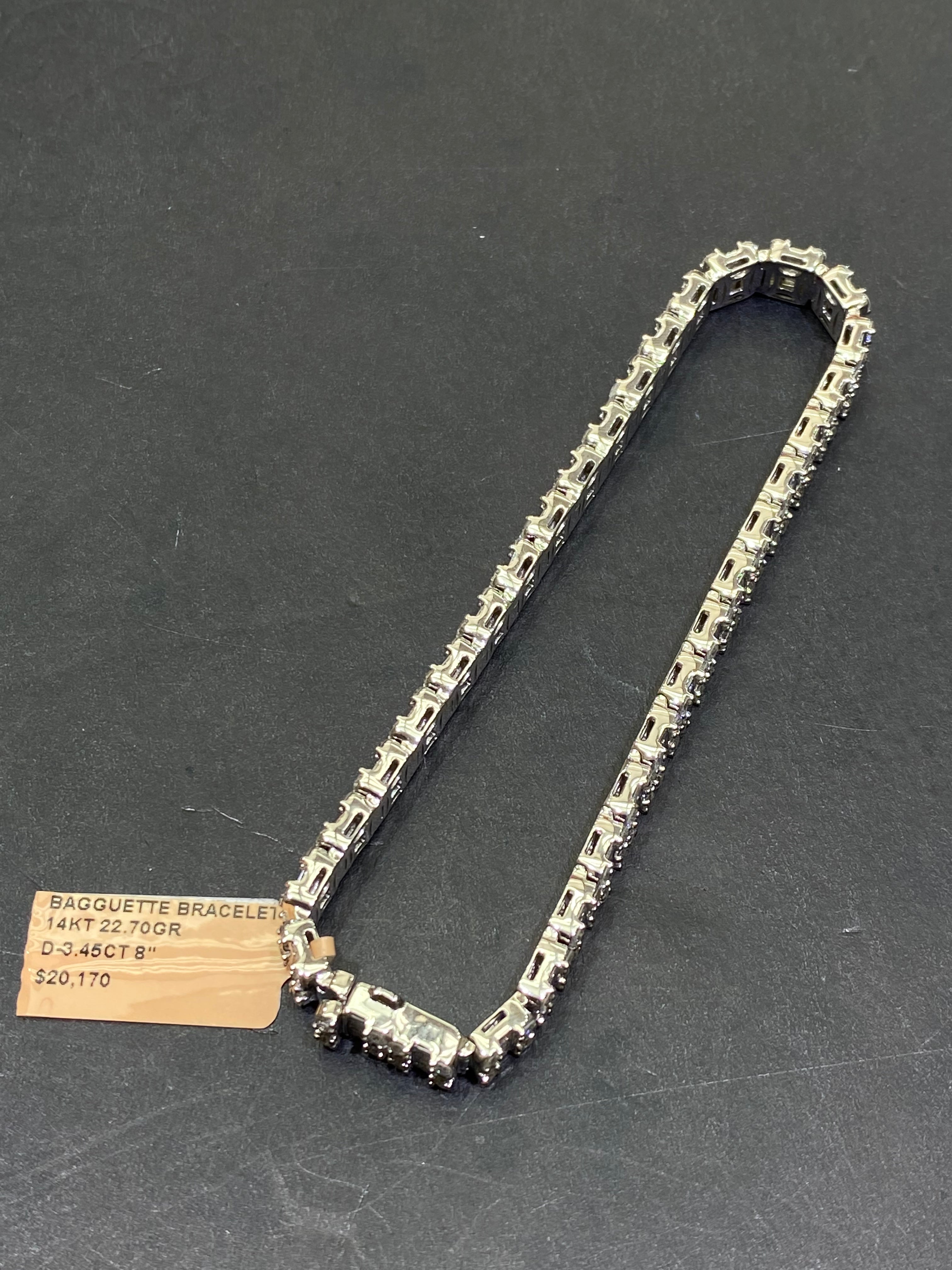 New 14k “iced”baguette bracelet Vvs1 G -color 4ctst.w. Natural diamonds