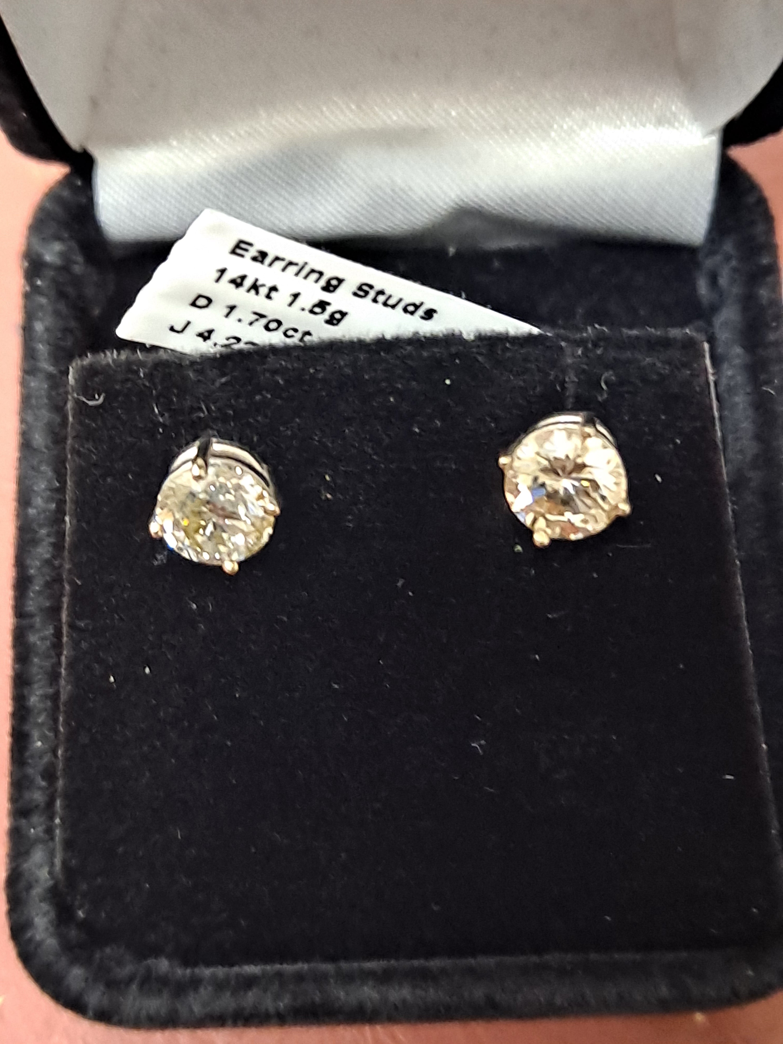 diamond stud earrings .85 cts each 1.70 cts t.w.