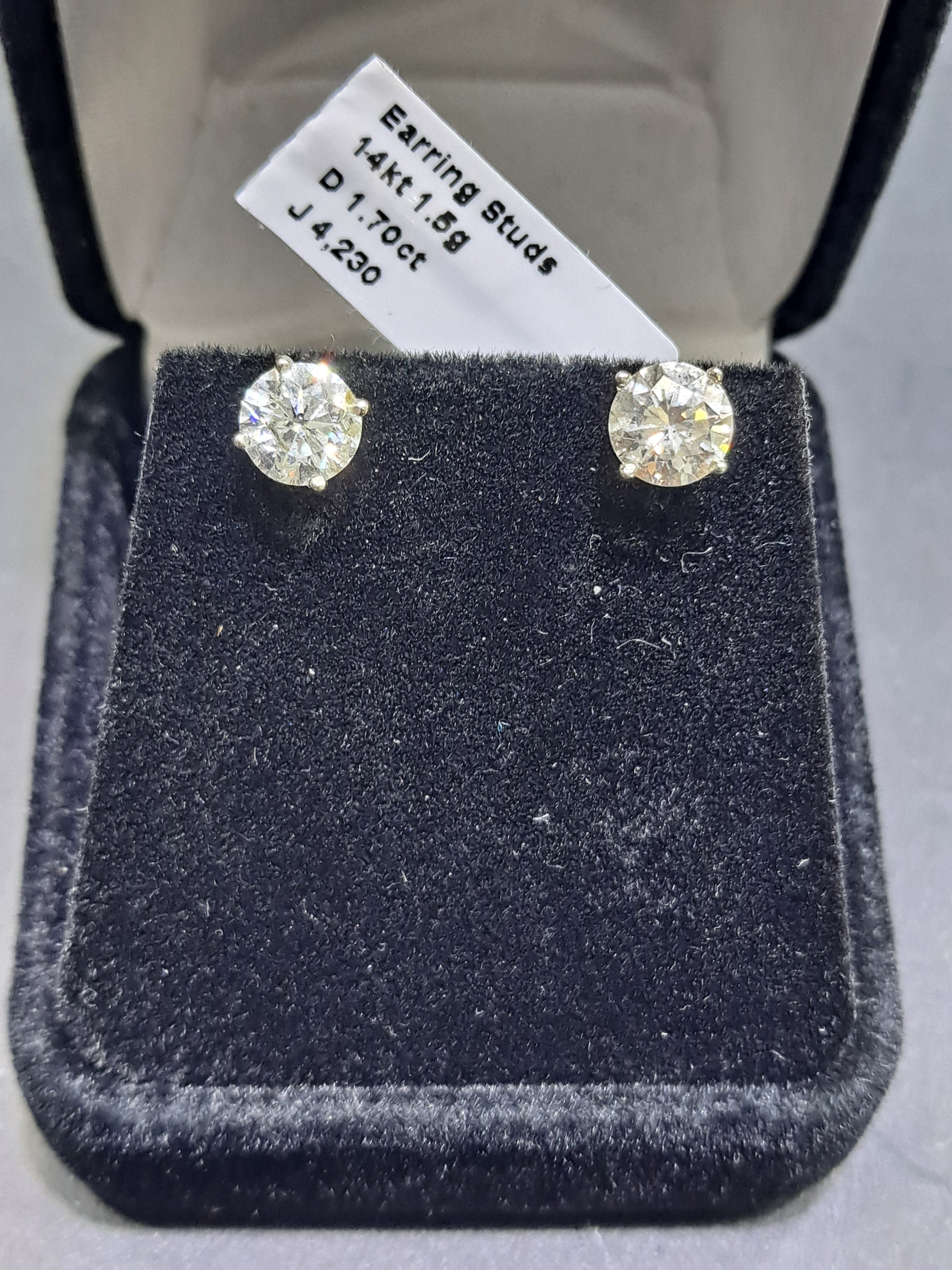 diamond stud earrings .85 cts each 1.70 cts t.w.