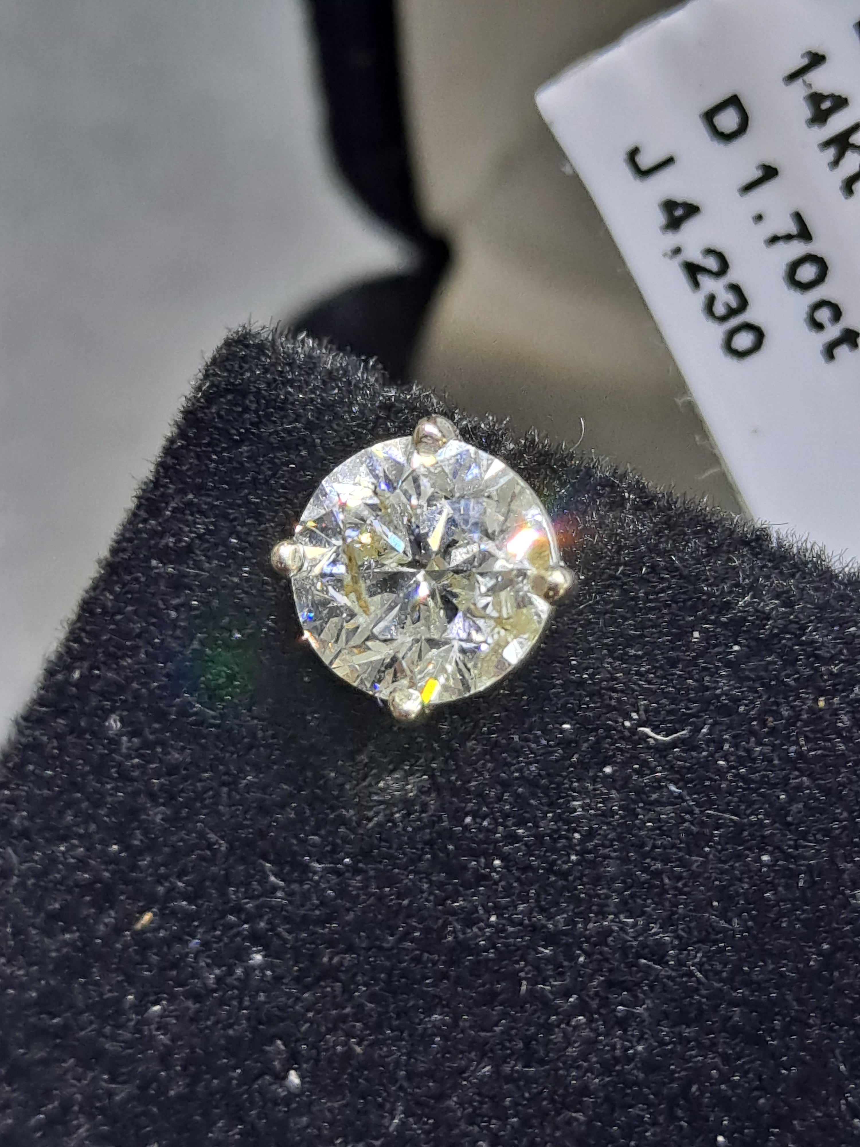 diamond stud earrings .85 cts each 1.70 cts t.w.