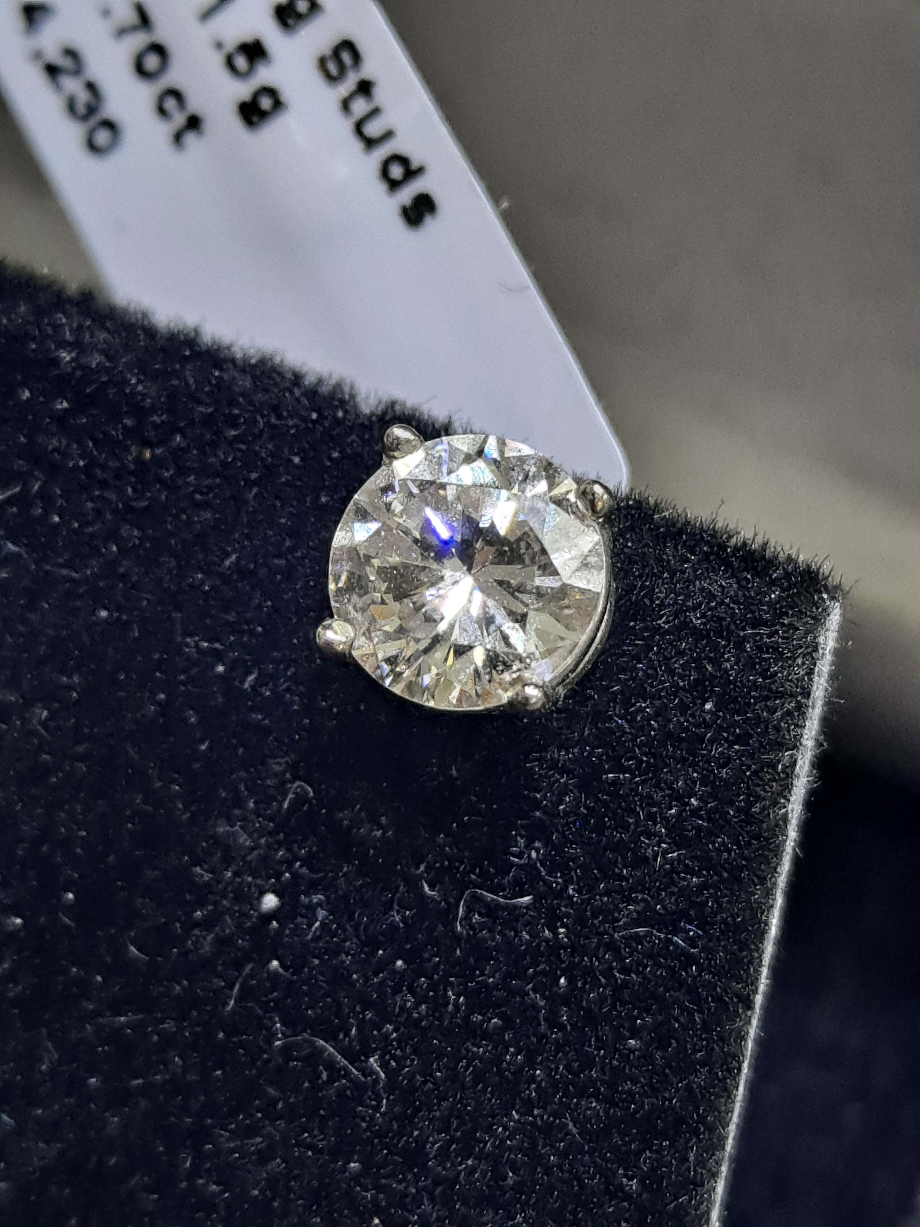 diamond stud earrings  .85 cts each   1.70 cts t.w.