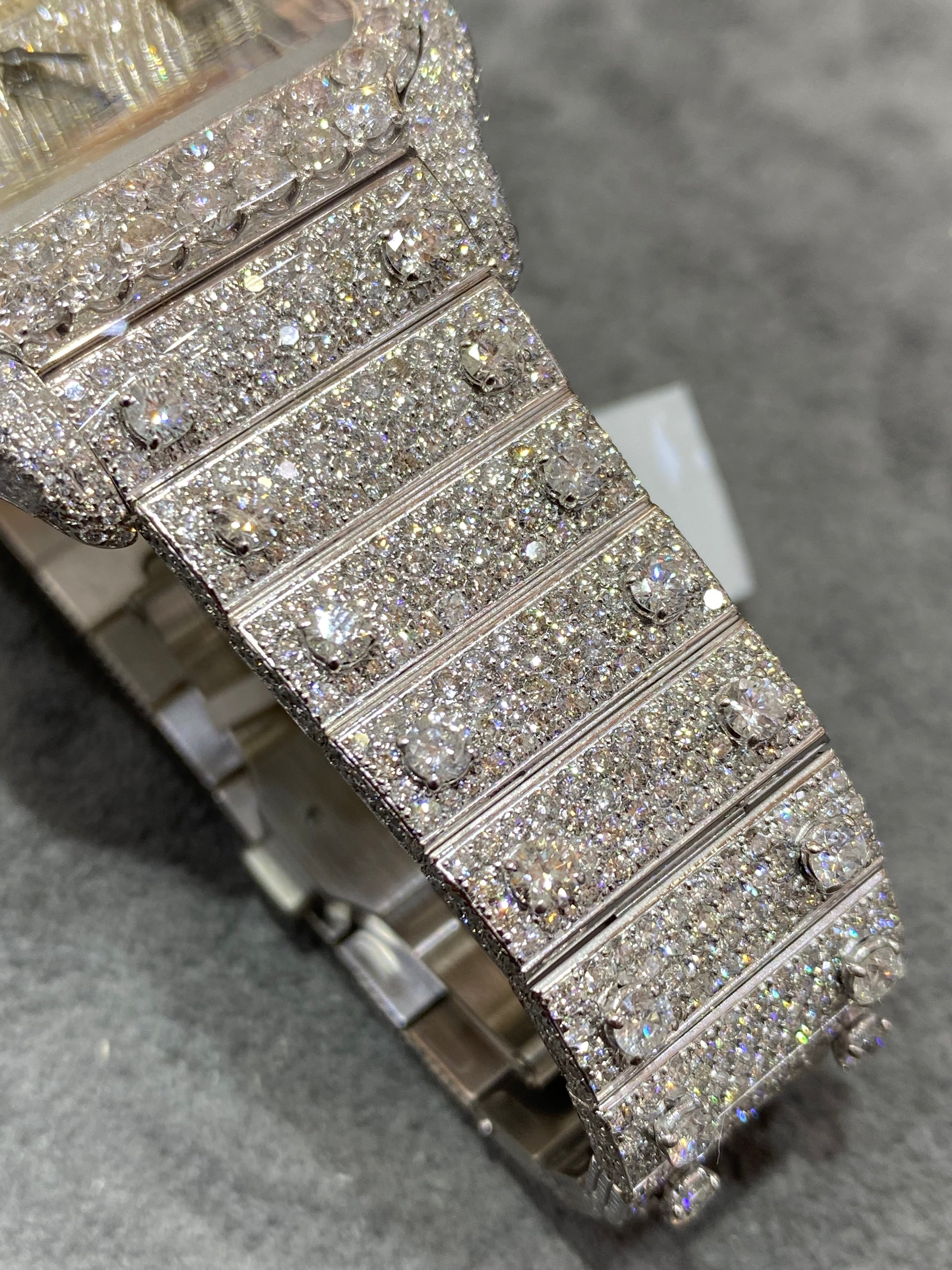 41mm cartier "iced bust down" watch. vs1 natural diamonds 25 cts t.w.. white