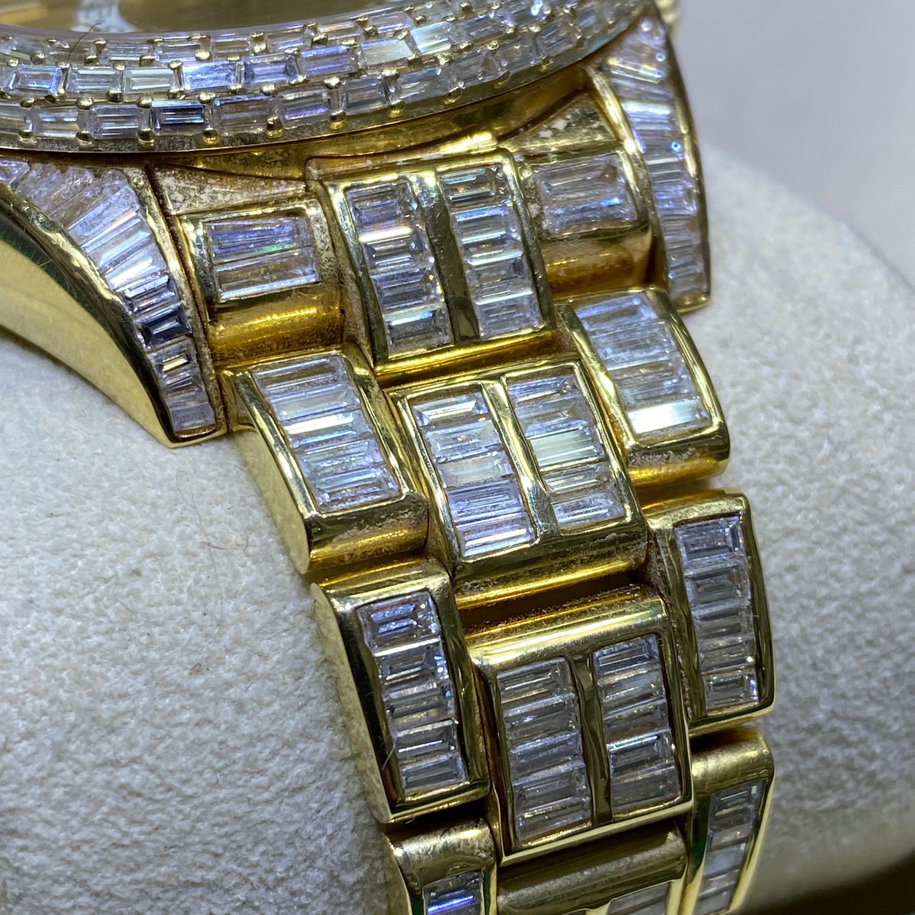 42mm rolex "iced bust down" sky dweller watch. 60 cts of VVS1 natural baguette diamonds and 18k solid gold