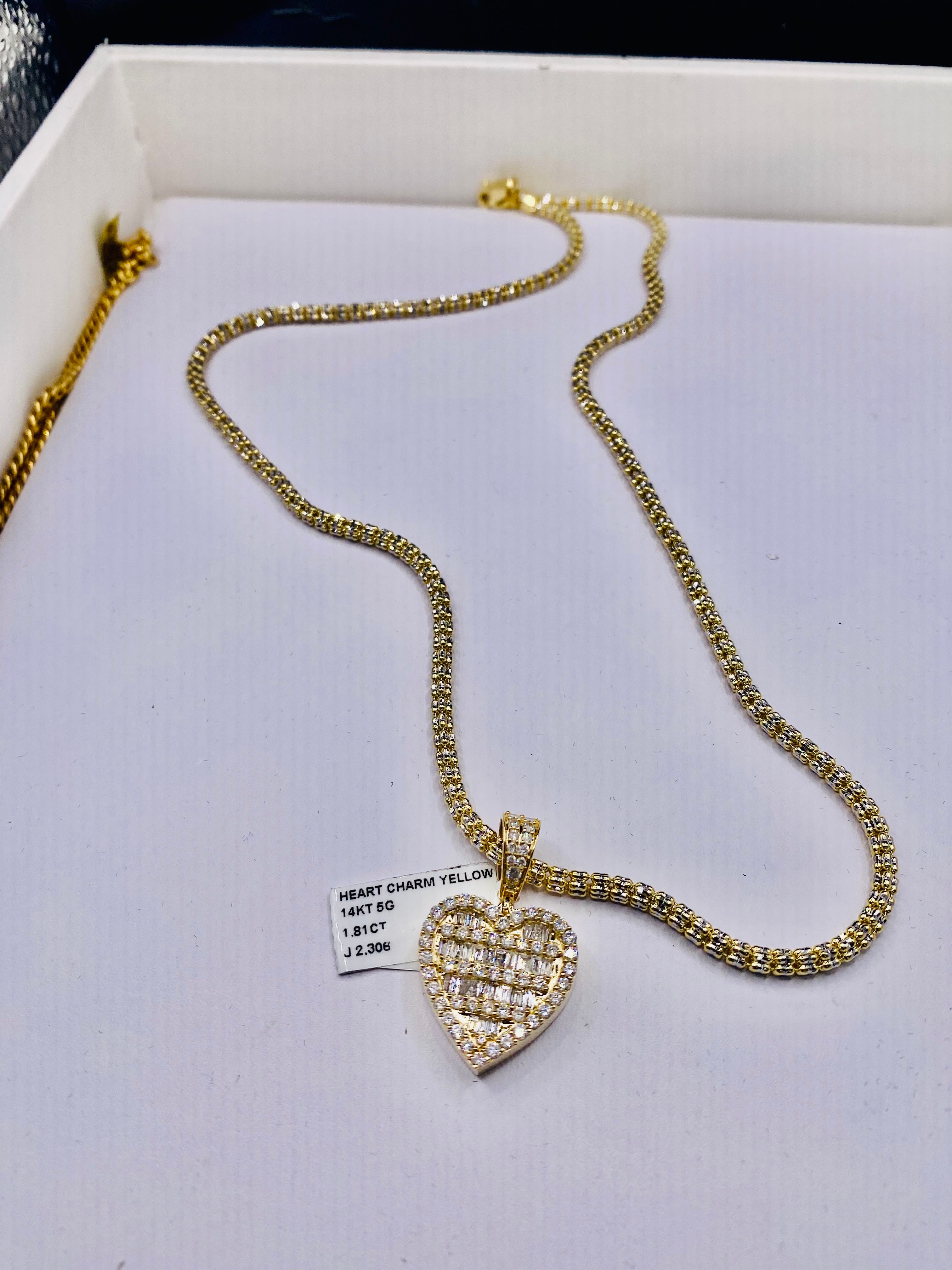 new 14k heart pendant,baguettes vs1 natural diamonds 1.8 cts.t.w