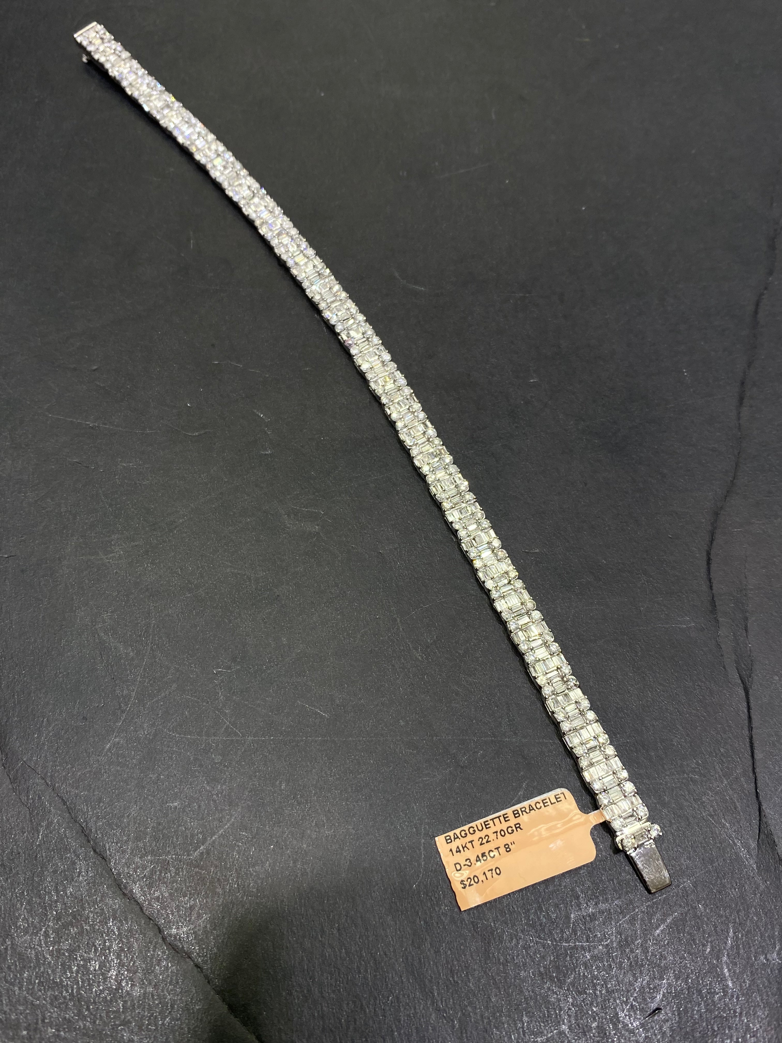 New 14k “iced”baguette bracelet Vvs1 G -color 4ctst.w. Natural diamonds