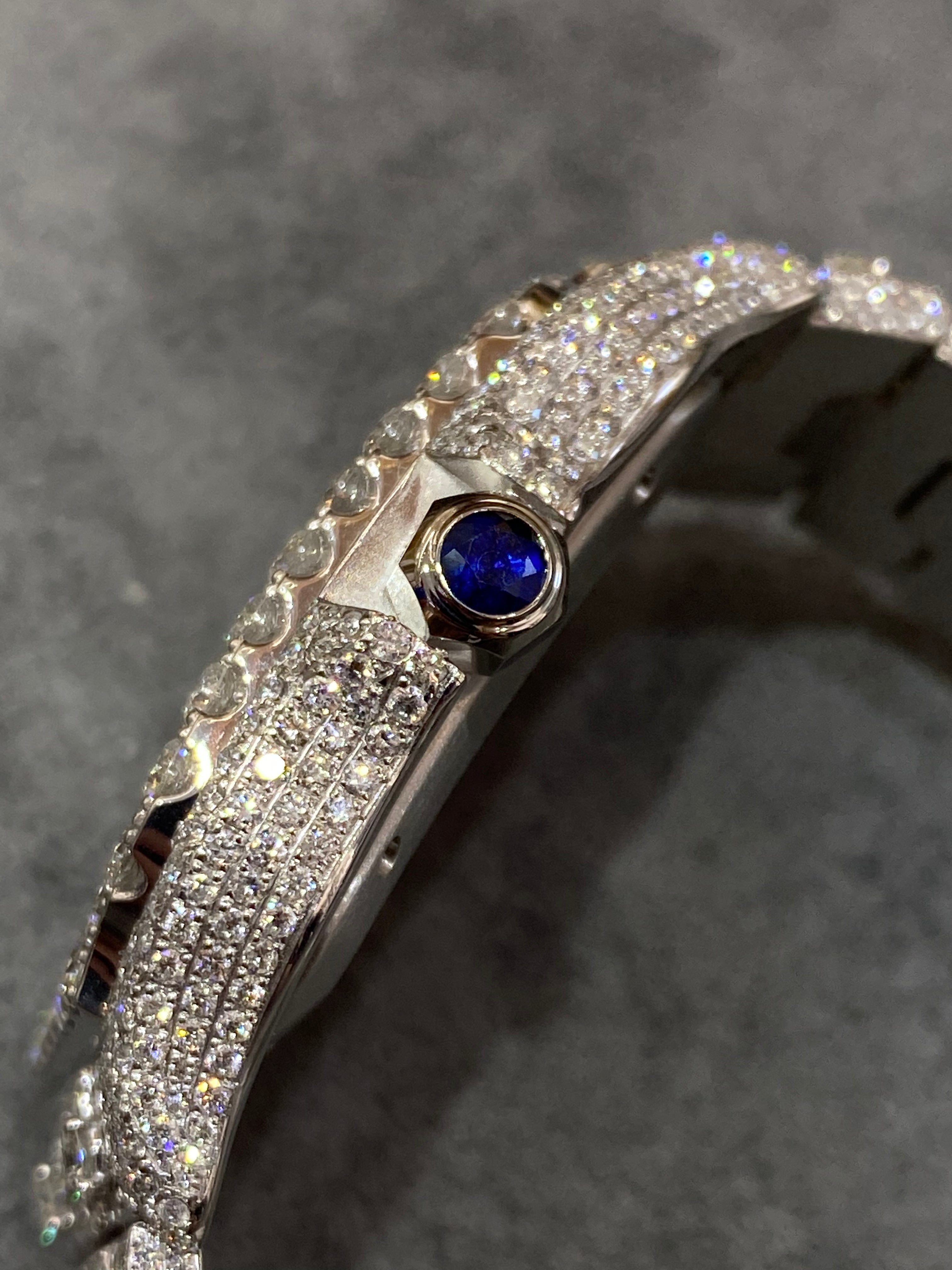 41mm cartier "iced bust down" watch. vs1 natural diamonds 25 cts t.w.. white