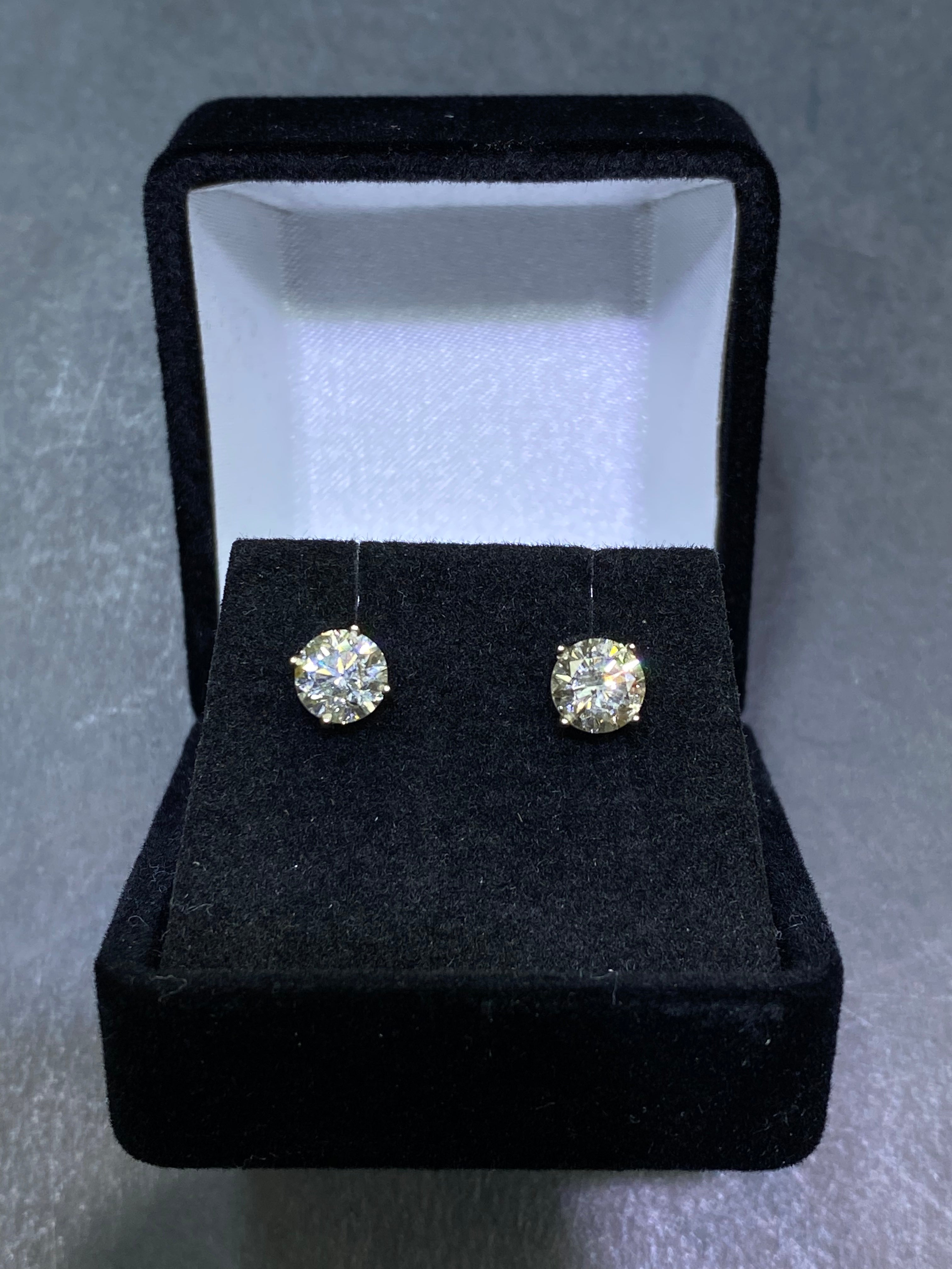 pair of.50 ct stud earrings