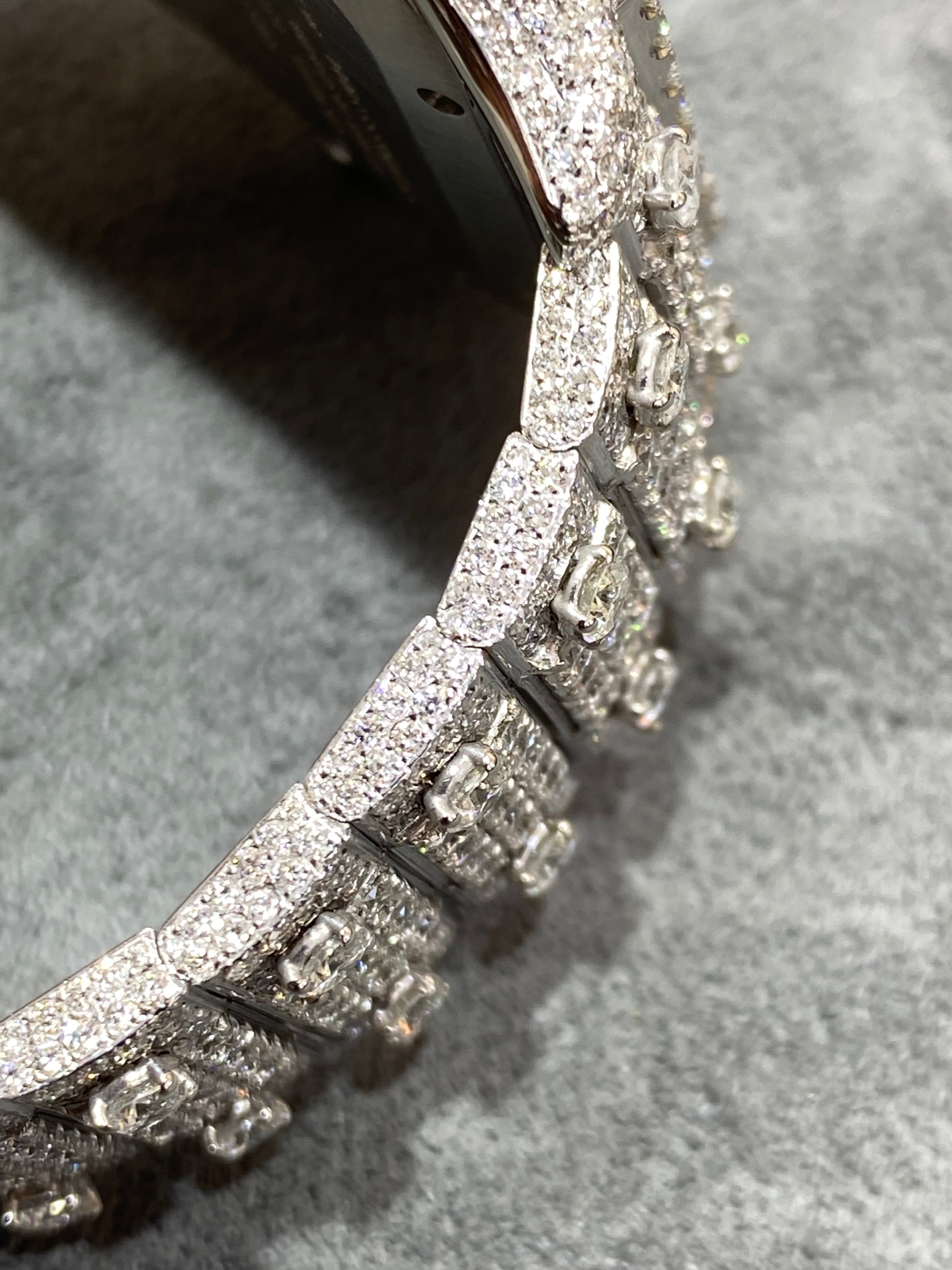 41mm cartier "iced bust down" watch. vs1 natural diamonds 25 cts t.w.. white