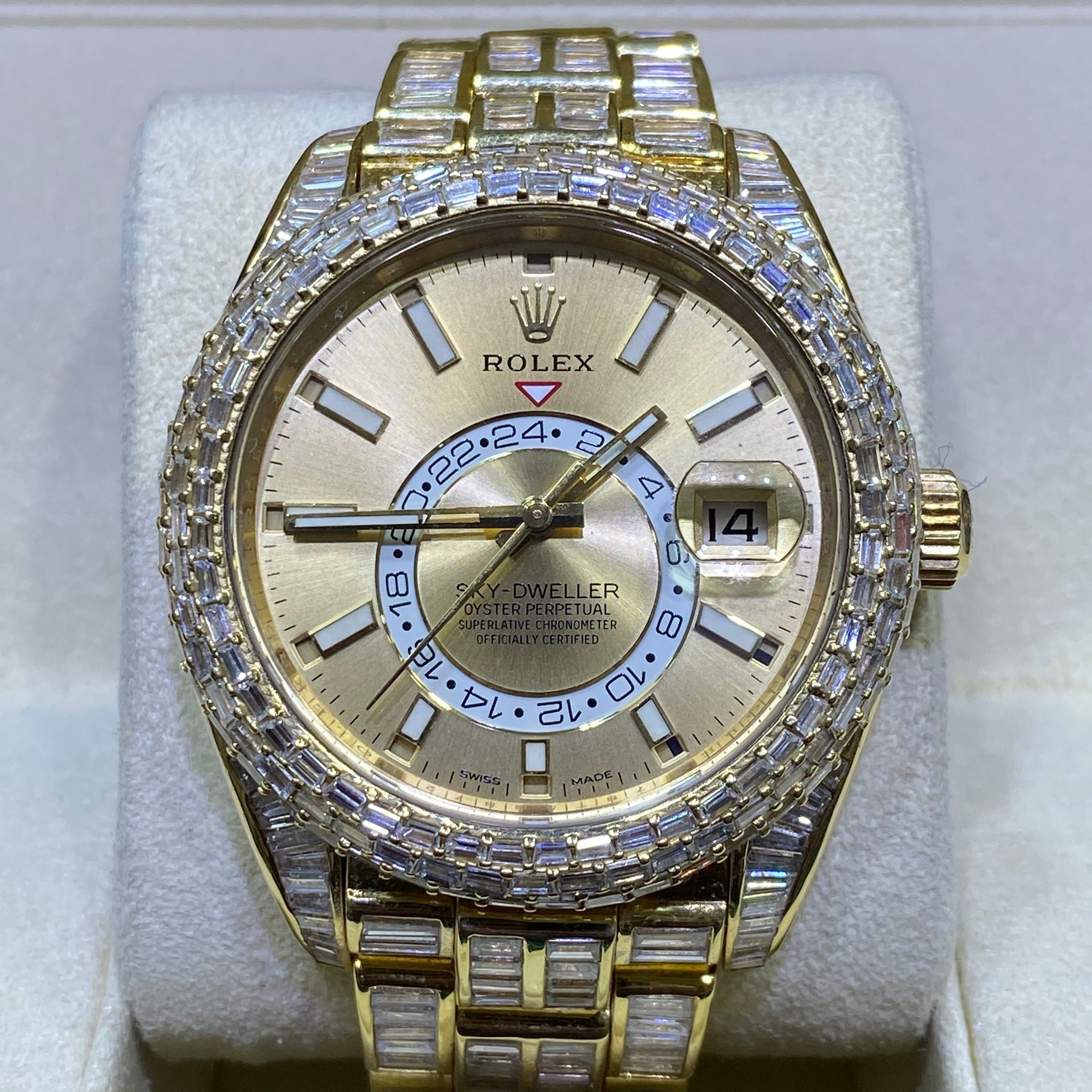 42mm rolex "iced bust down" sky dweller watch. 60 cts of VVS1 natural baguette diamonds and 18k solid gold