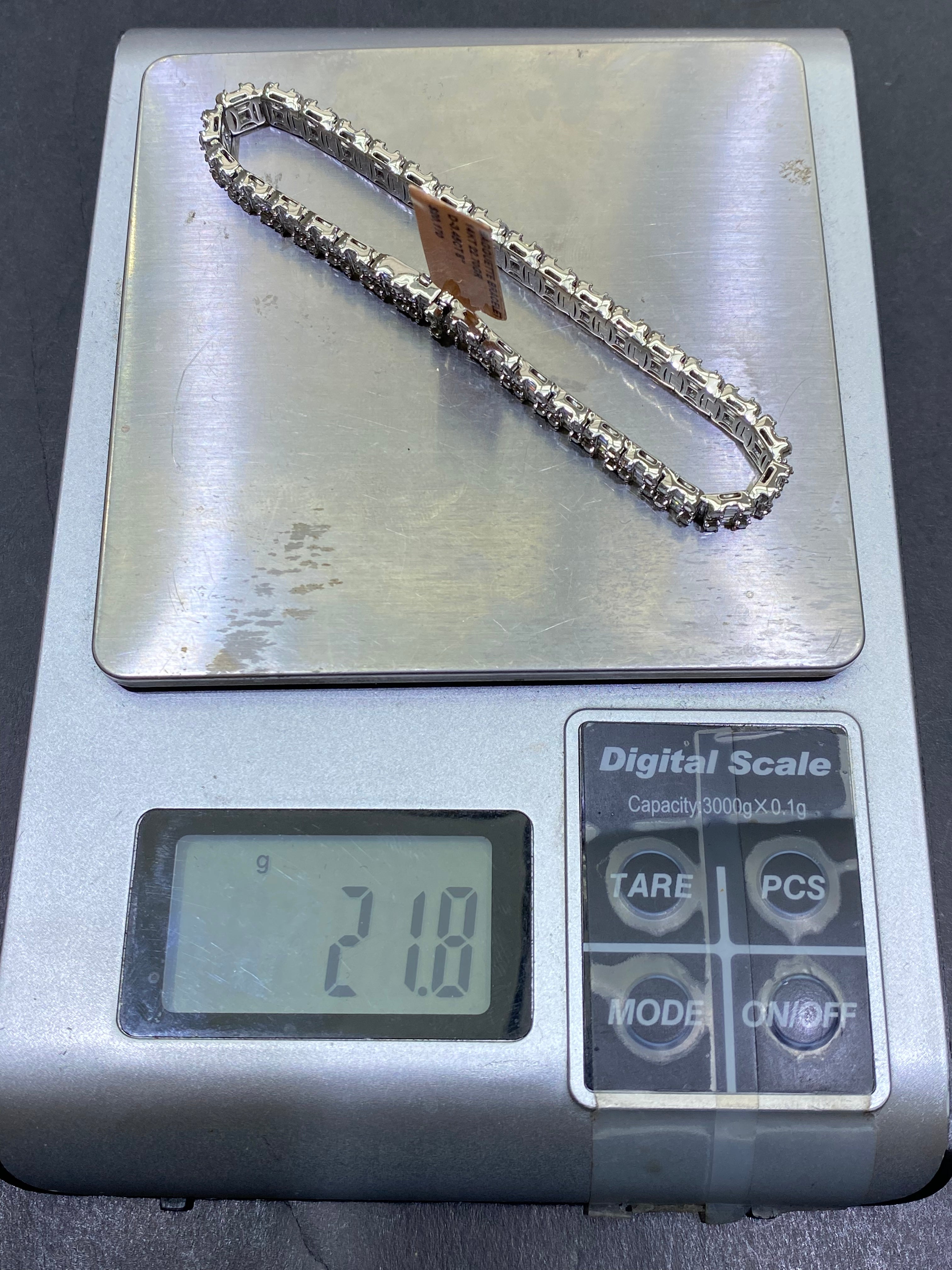 New 14k “iced”baguette bracelet Vvs1 G -color 4ctst.w. Natural diamonds