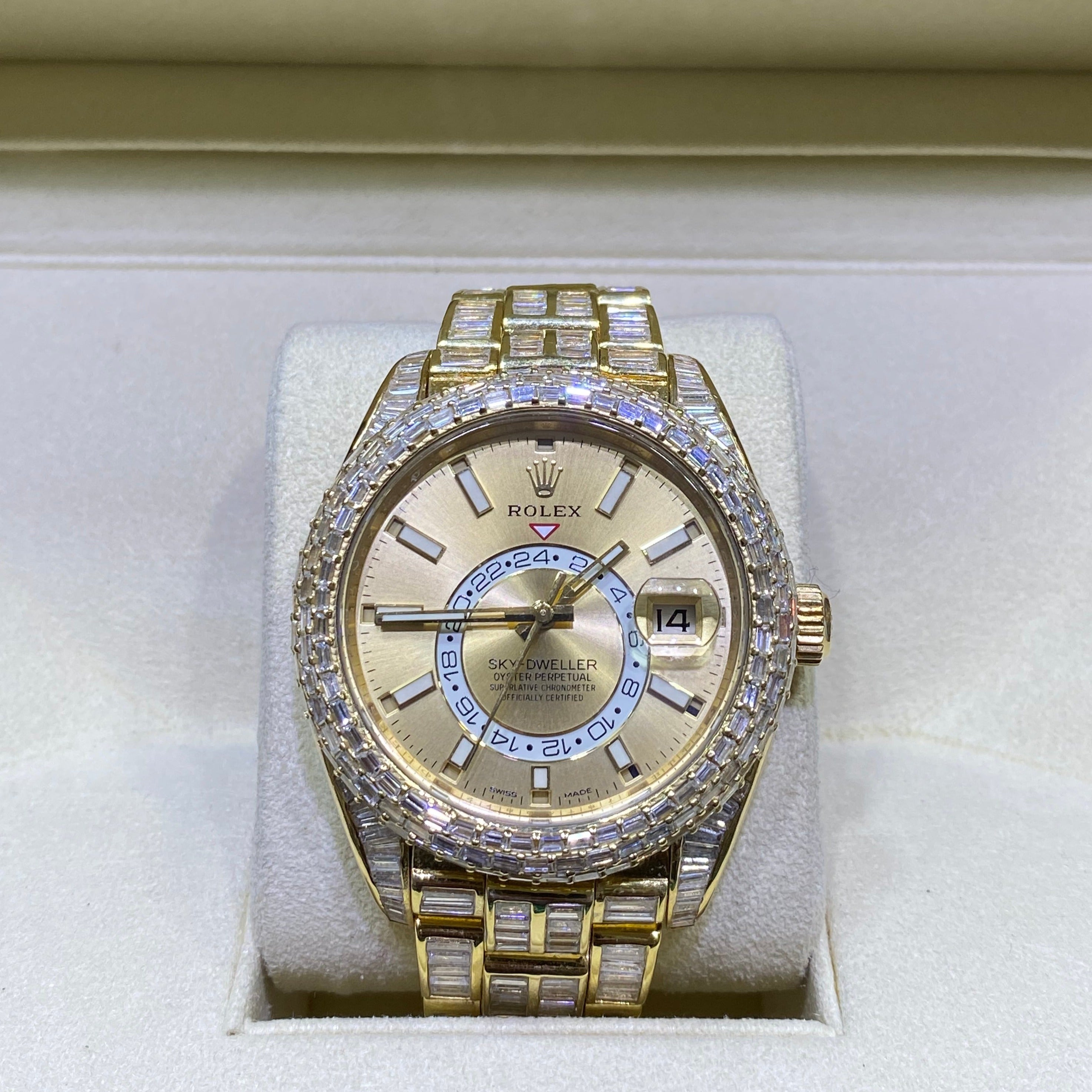 42mm rolex "iced bust down" sky dweller watch. 60 cts of VVS1 natural baguette diamonds and 18k solid gold