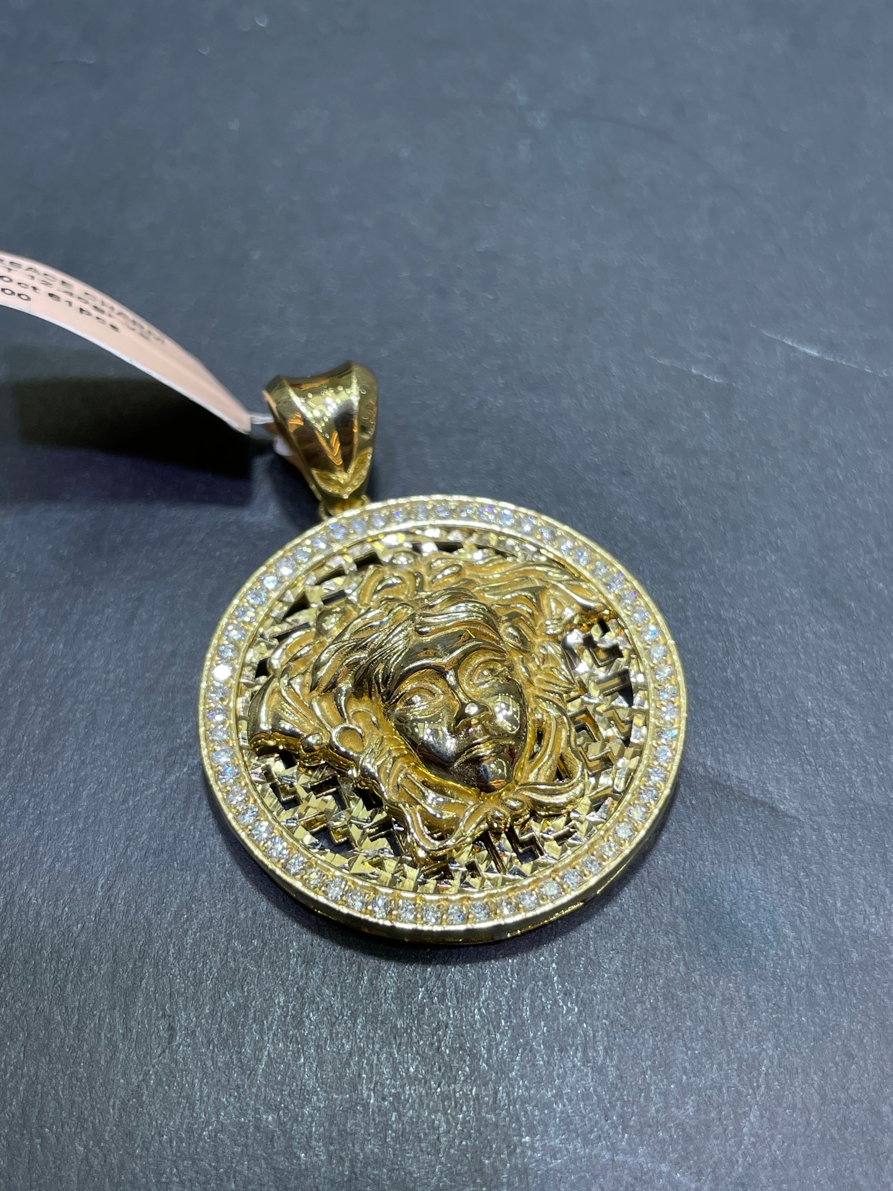 14k vs1 natural diamonds Medusa charm handmade at our Miami store fite diamonds 12 grams