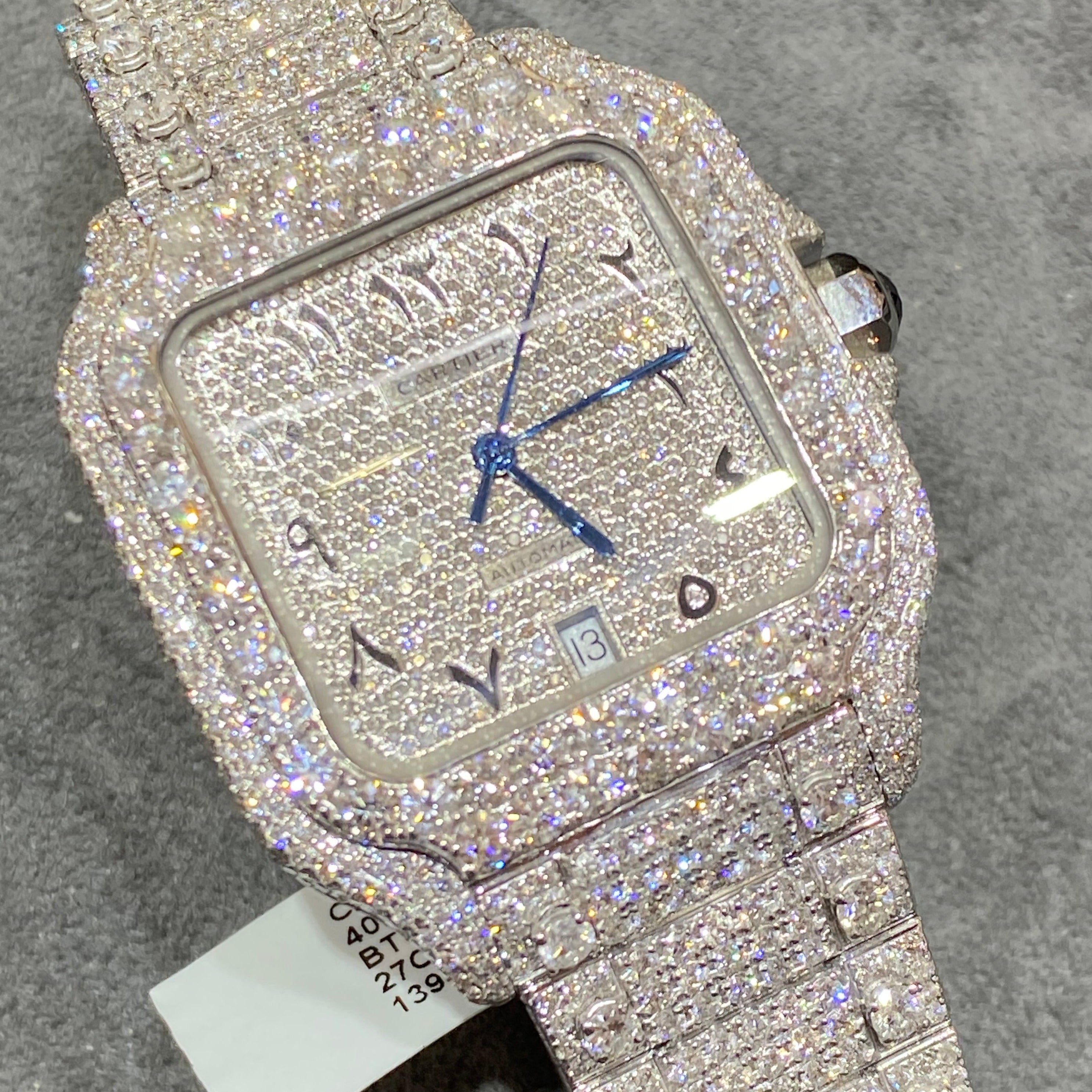 41mm cartier "iced bust down" watch. vs1 natural diamonds 25 cts t.w.. white