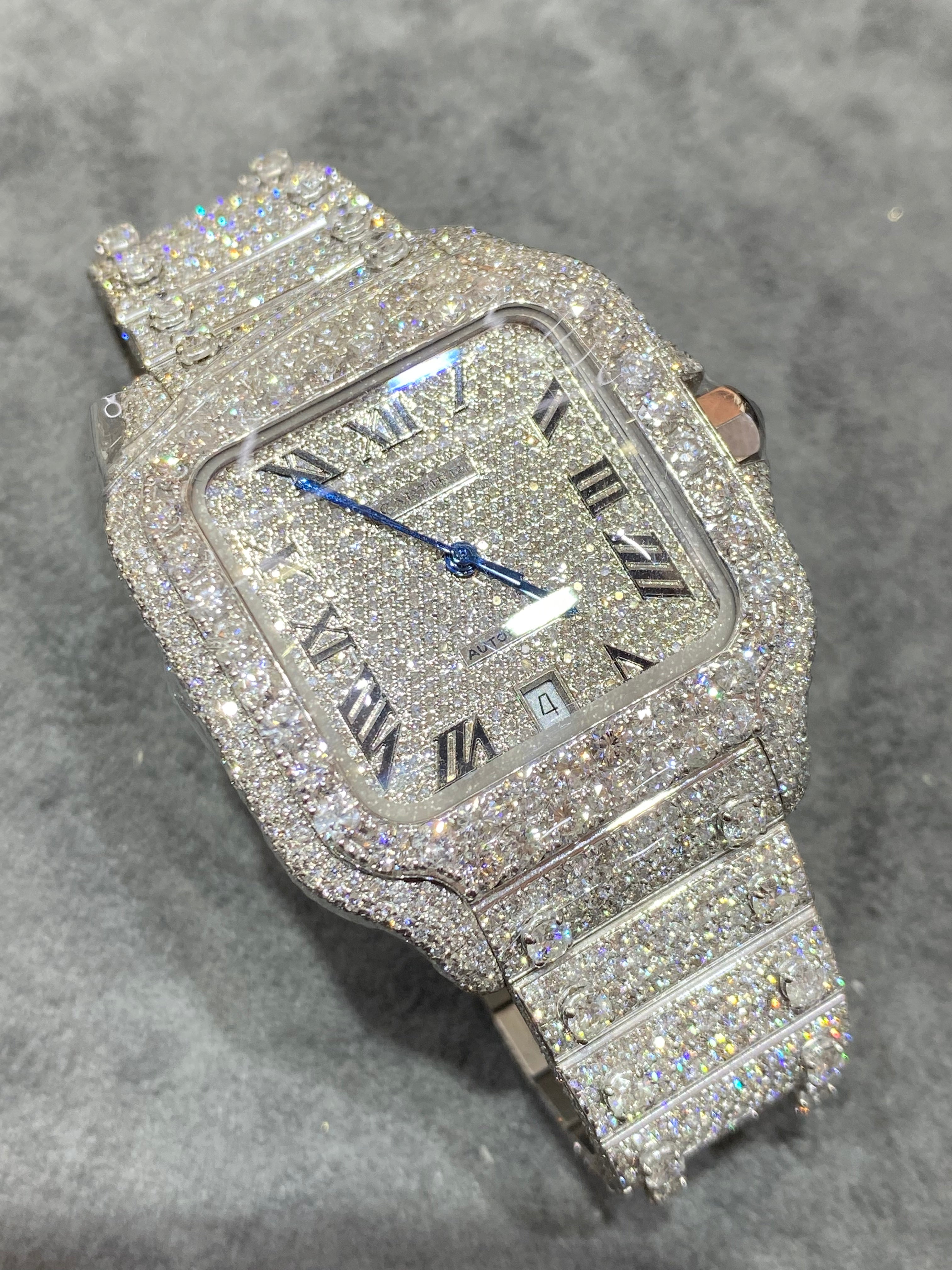 41mm cartier "iced bust down" watch. vs1 natural diamonds 25 cts t.w.. white