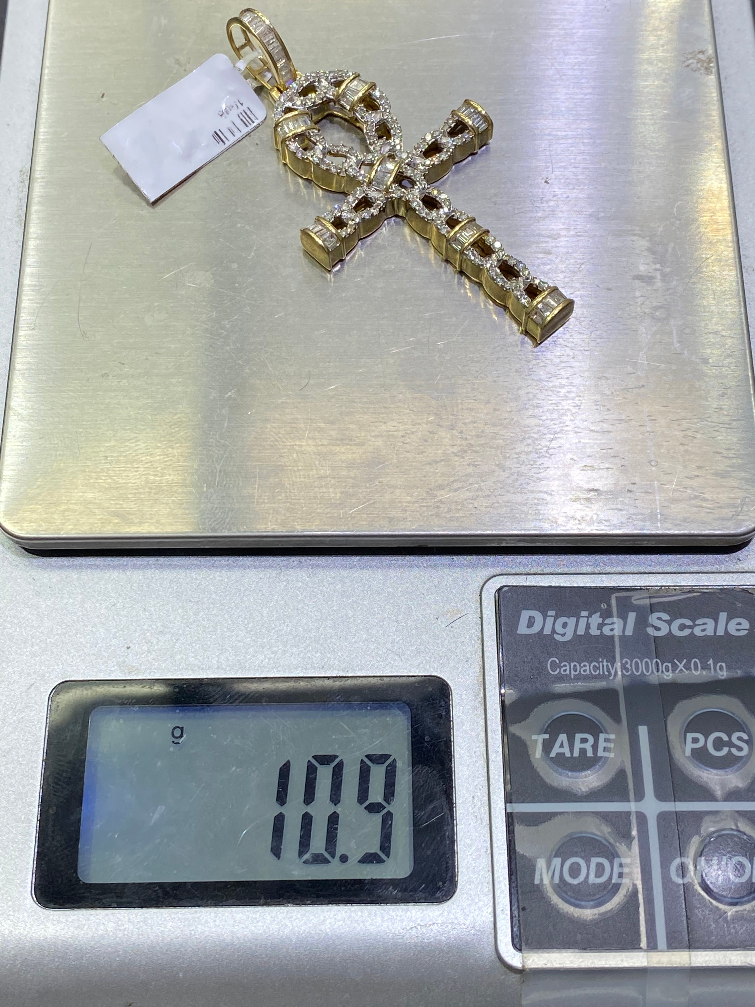 14k "iced out" Egyptian Cross Pendant vs1 natural diamonds 1.3 ct t.w. 10 grams of 14k Gold