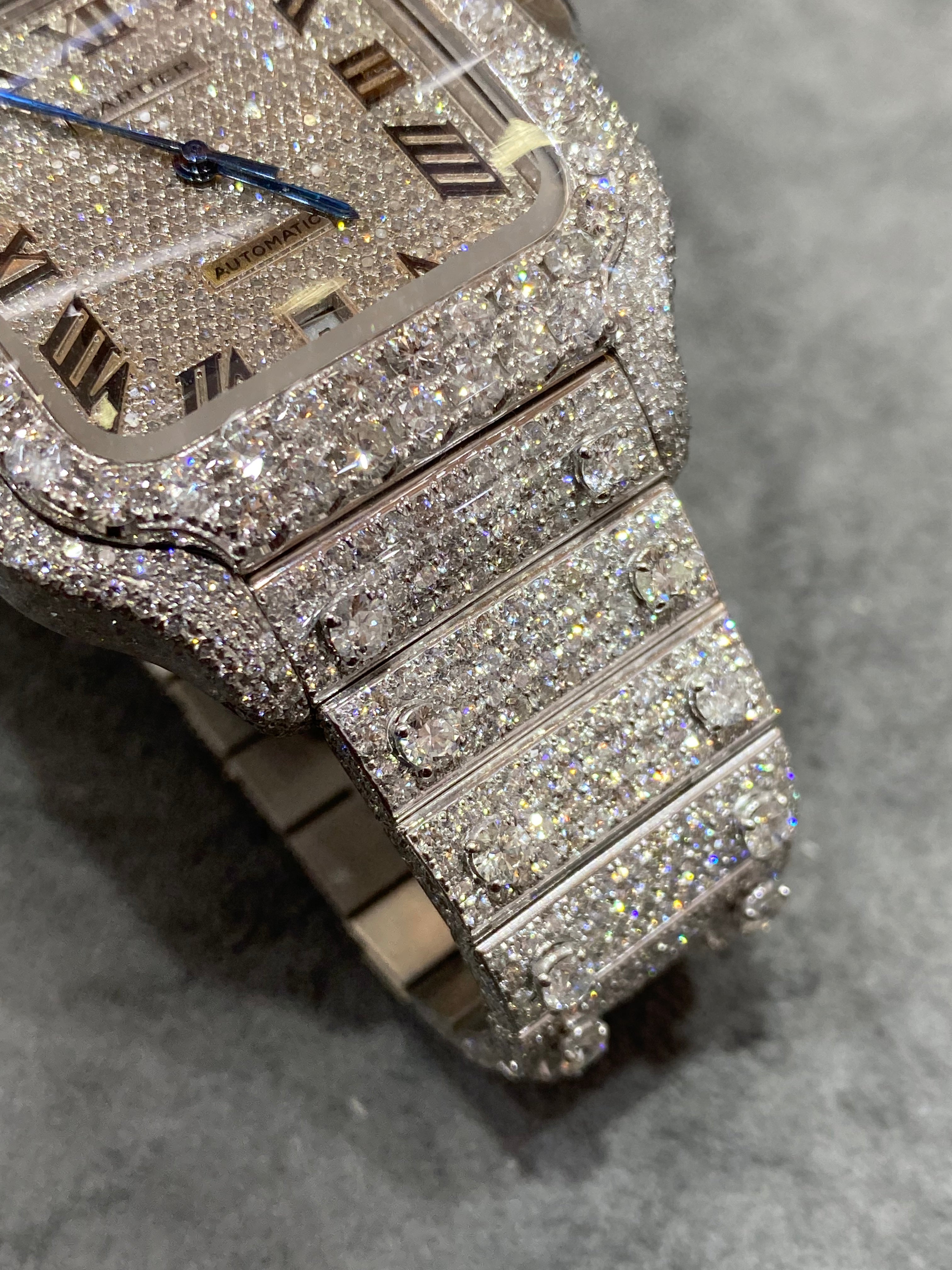 41mm cartier "iced bust down" watch. vs1 natural diamonds 25 cts t.w.. white
