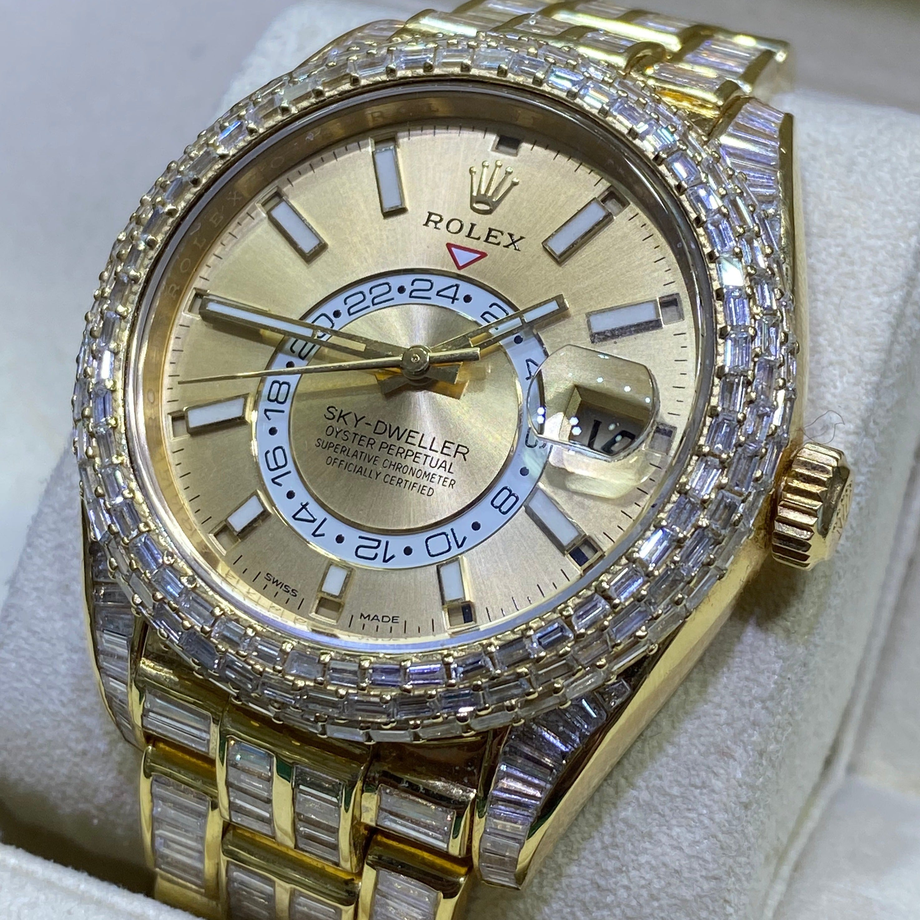 42mm rolex "iced bust down" sky dweller watch. 60 cts of VVS1 natural baguette diamonds and 18k solid gold