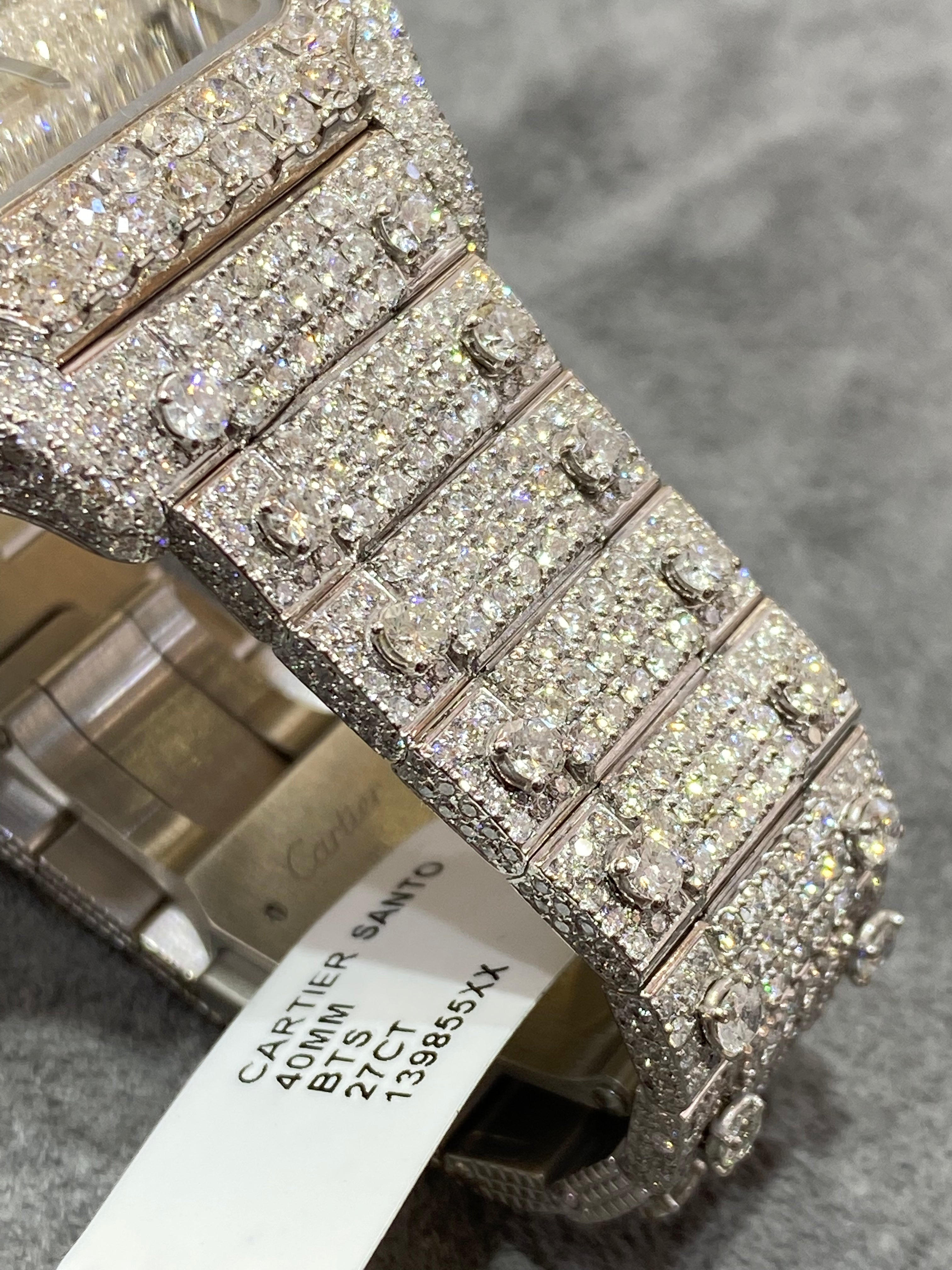41mm cartier "iced bust down" watch. vs1 natural diamonds 25 cts t.w.. white