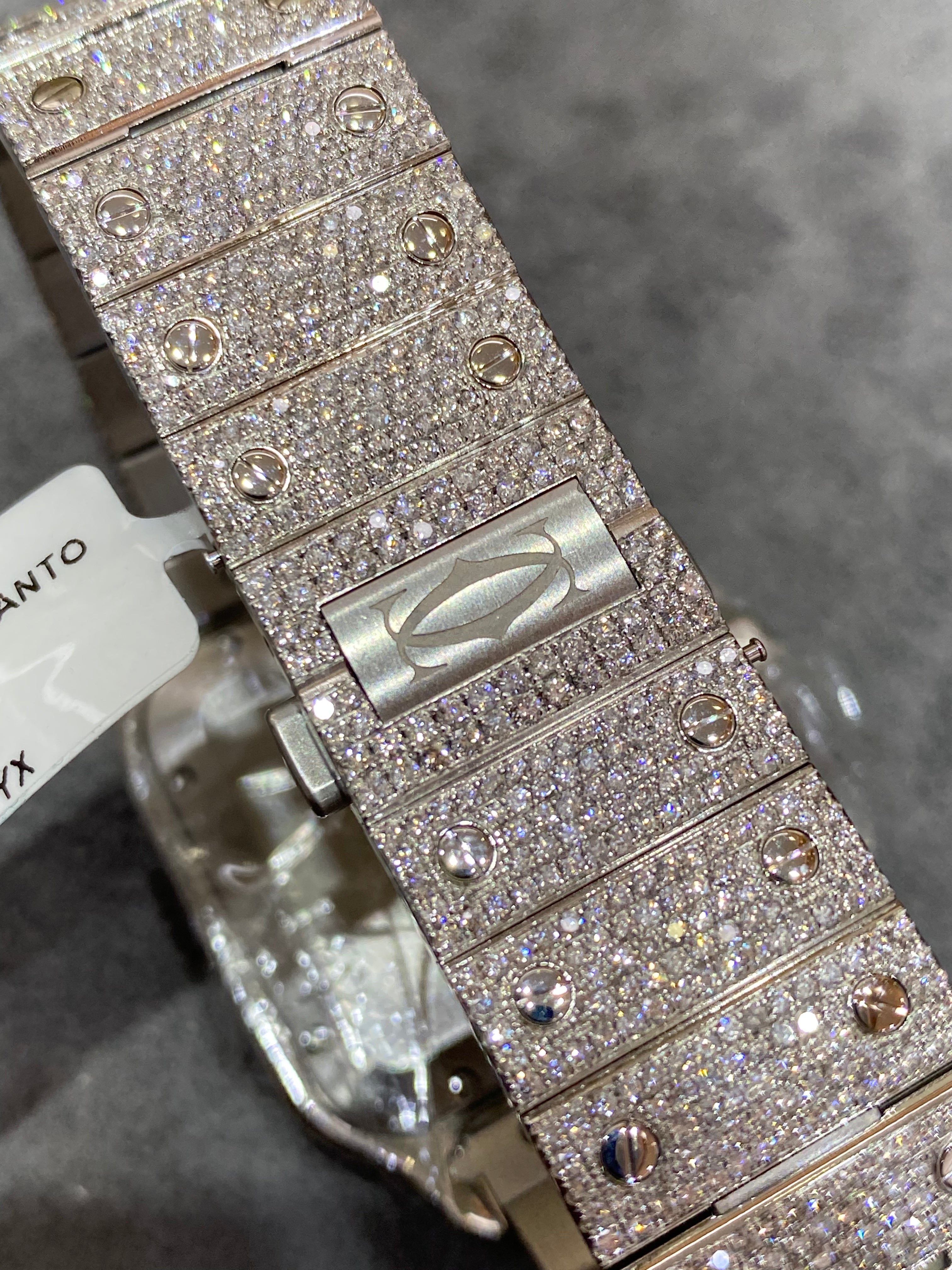 41mm cartier "iced bust down" watch. vs1 natural diamonds 25 cts t.w.. white