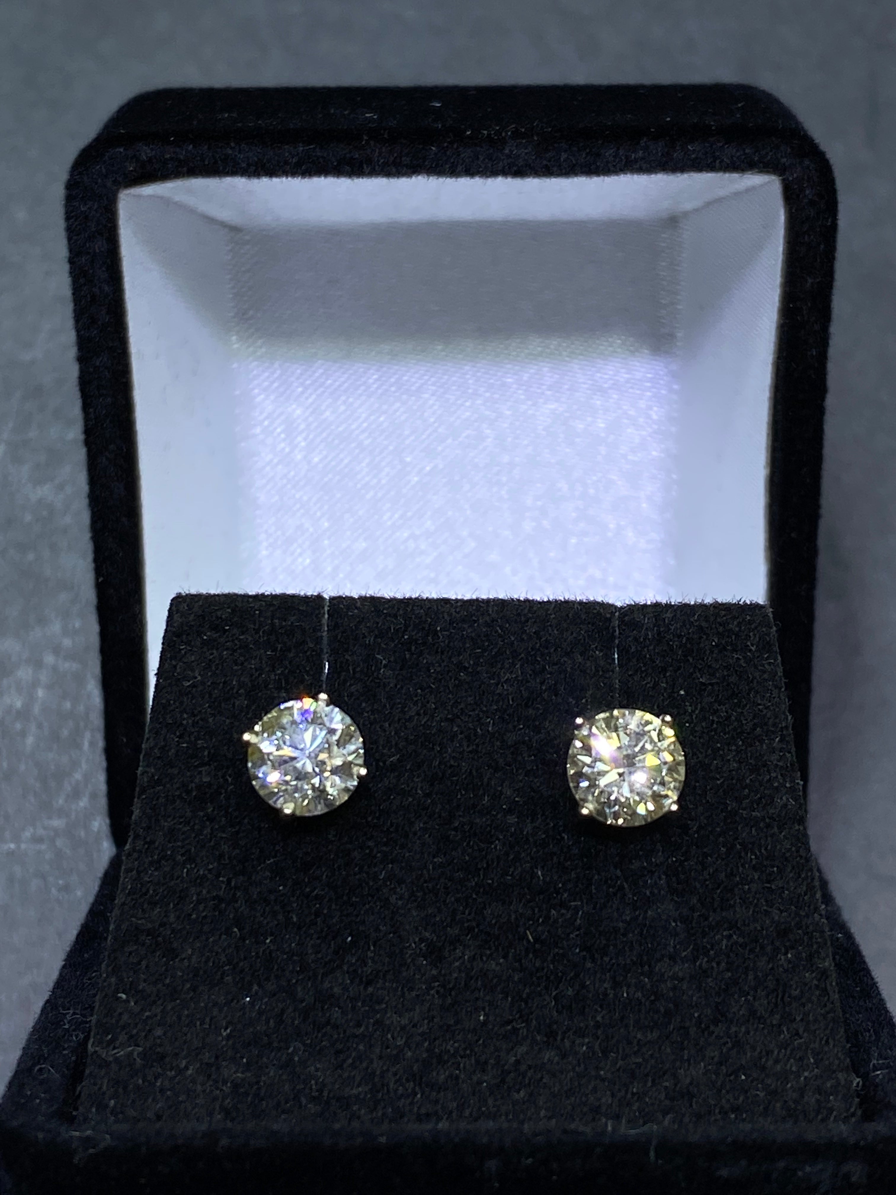 pair of.50 ct stud earrings 1.0carat total weight si-1,j color natural π