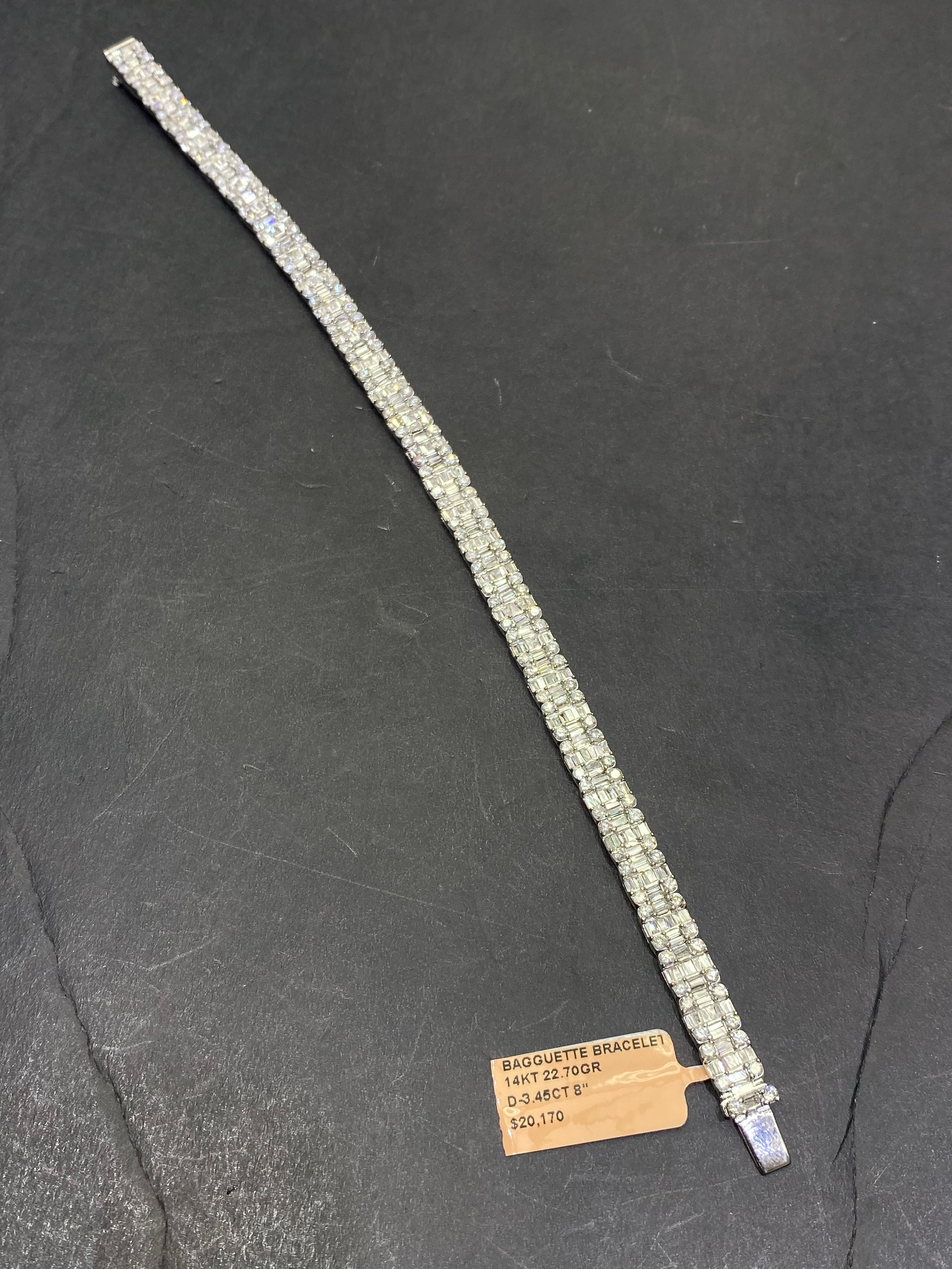 New 14k “iced”baguette bracelet Vvs1 G -color 4ctst.w. Natural diamonds