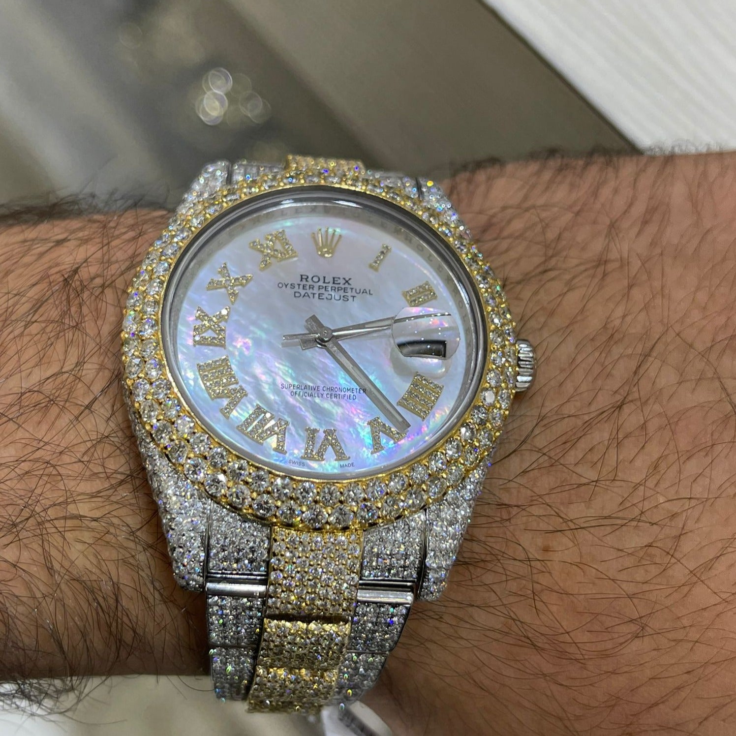41mm rolex #126300 m.o.pearl roman dial 29cts.t.w.new flower diamond setting