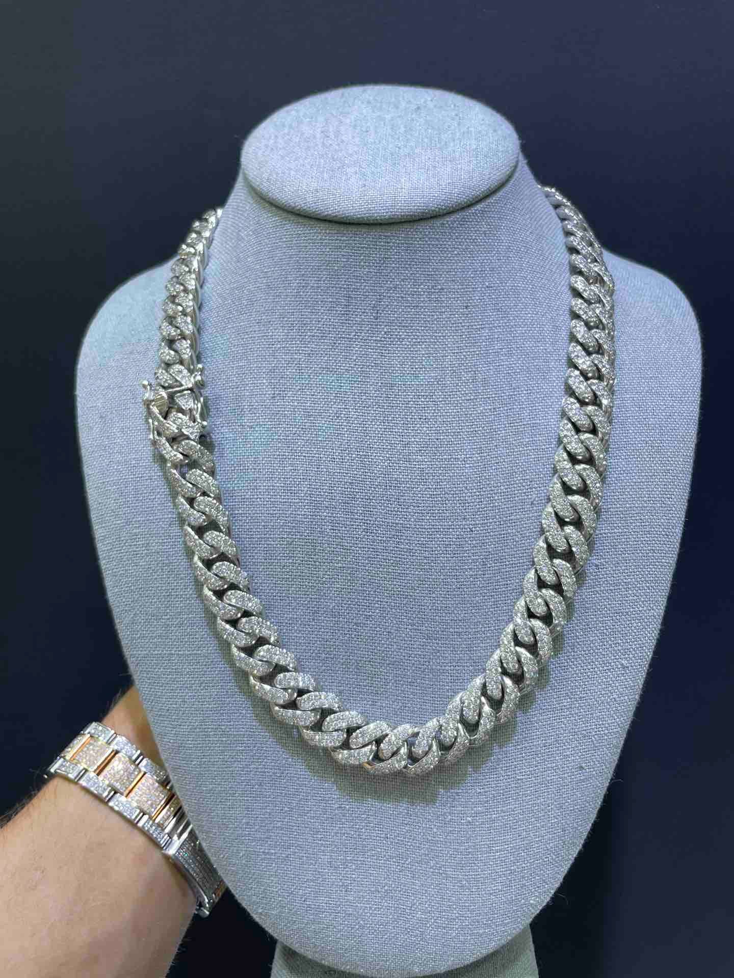 ICED OUT CUBAN LINK natural diamonds 240.9 grams.