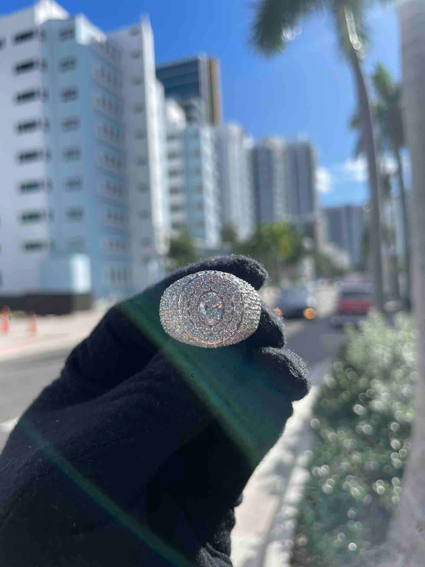 14k ICED OUT VVS RING FULLY