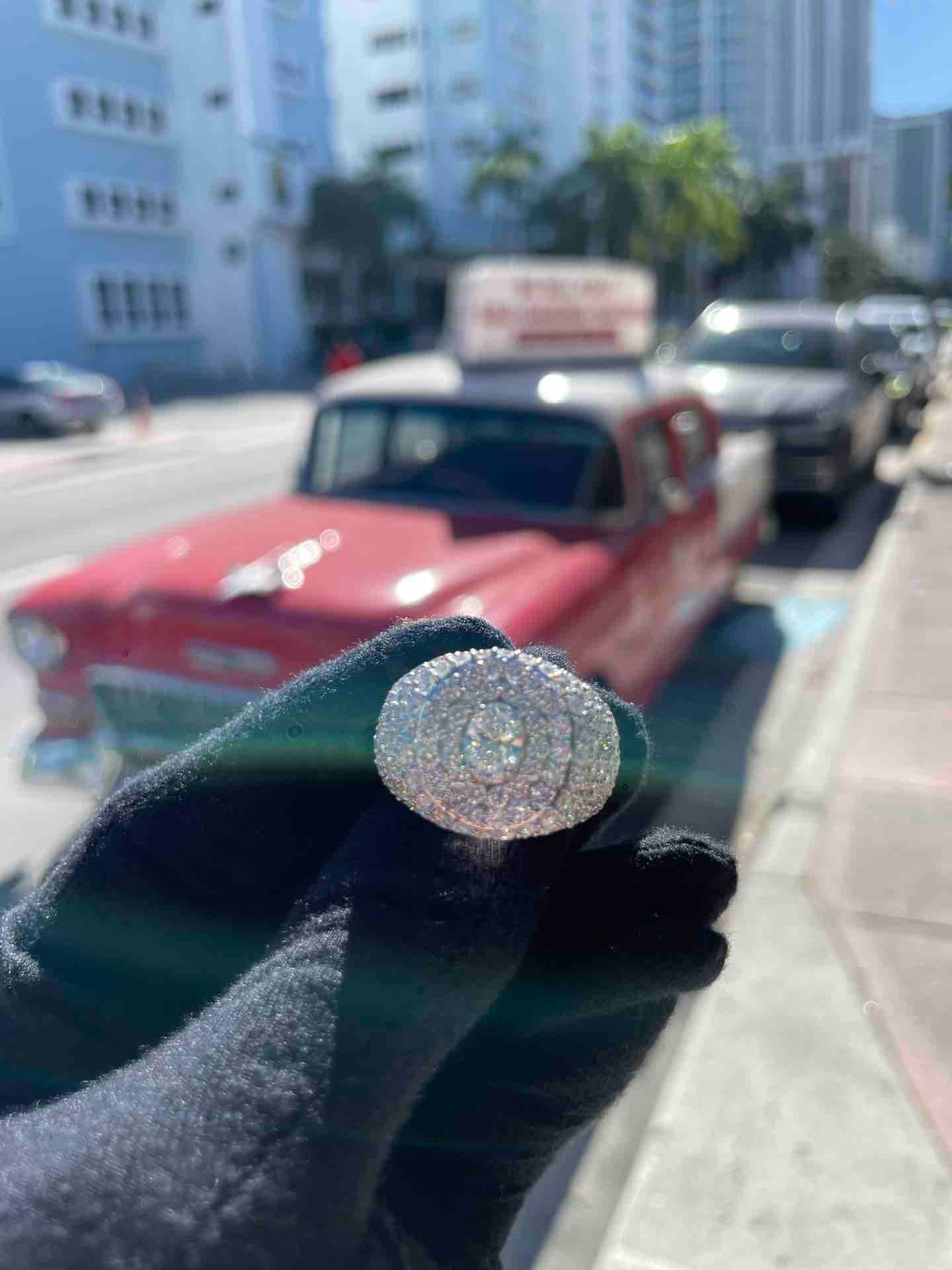 14k ICED OUT VVS RING FULLY