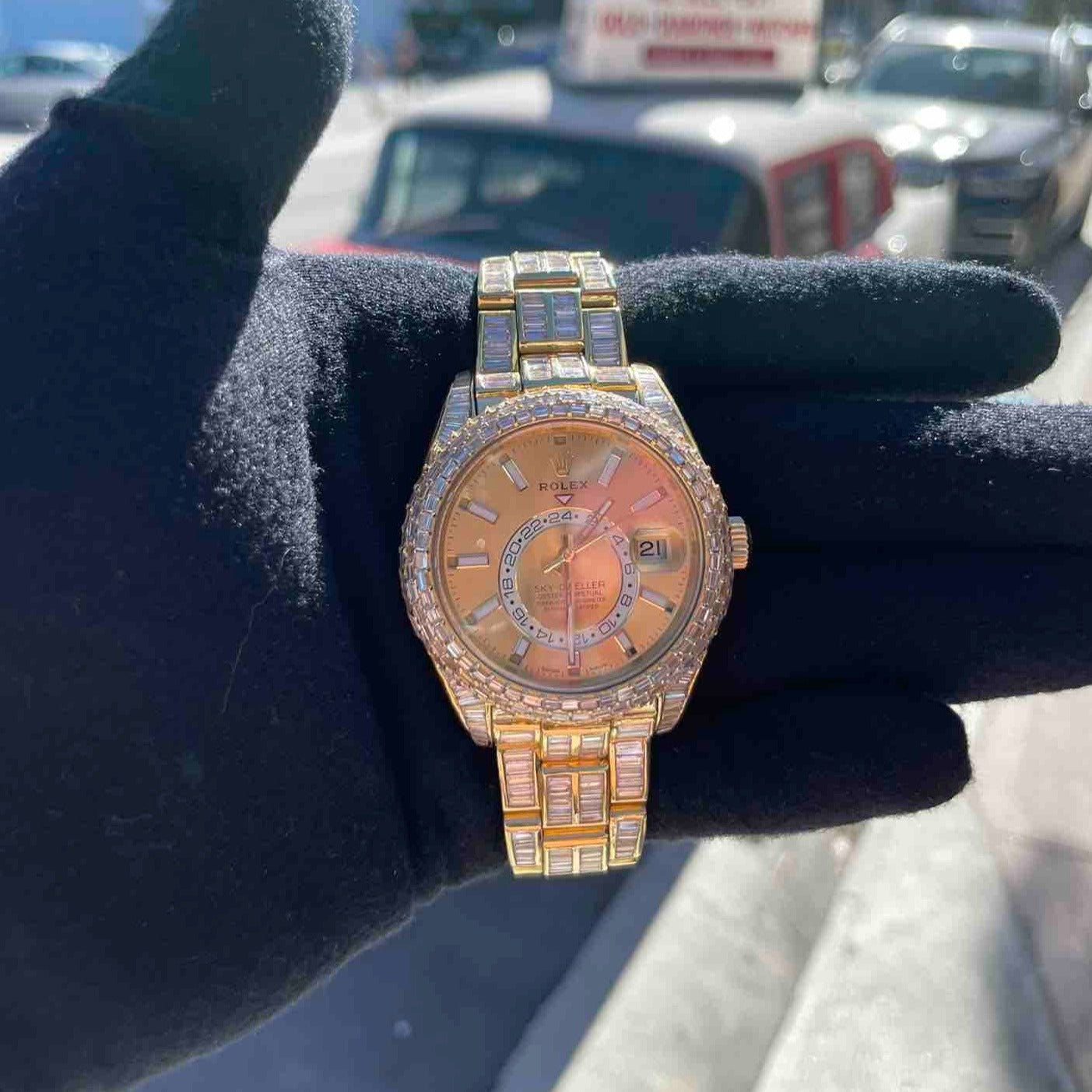 42mm rolex "iced bust down" sky dweller watch. 60 cts of VVS1 natural baguette diamonds and 18k solid gold