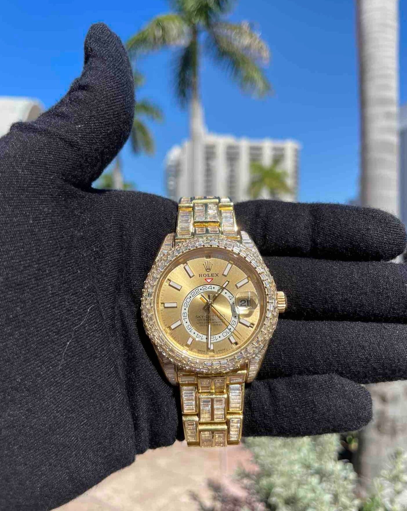42mm rolex "iced bust down" sky dweller watch. 60 cts of VVS1 natural baguette diamonds and 18k solid gold