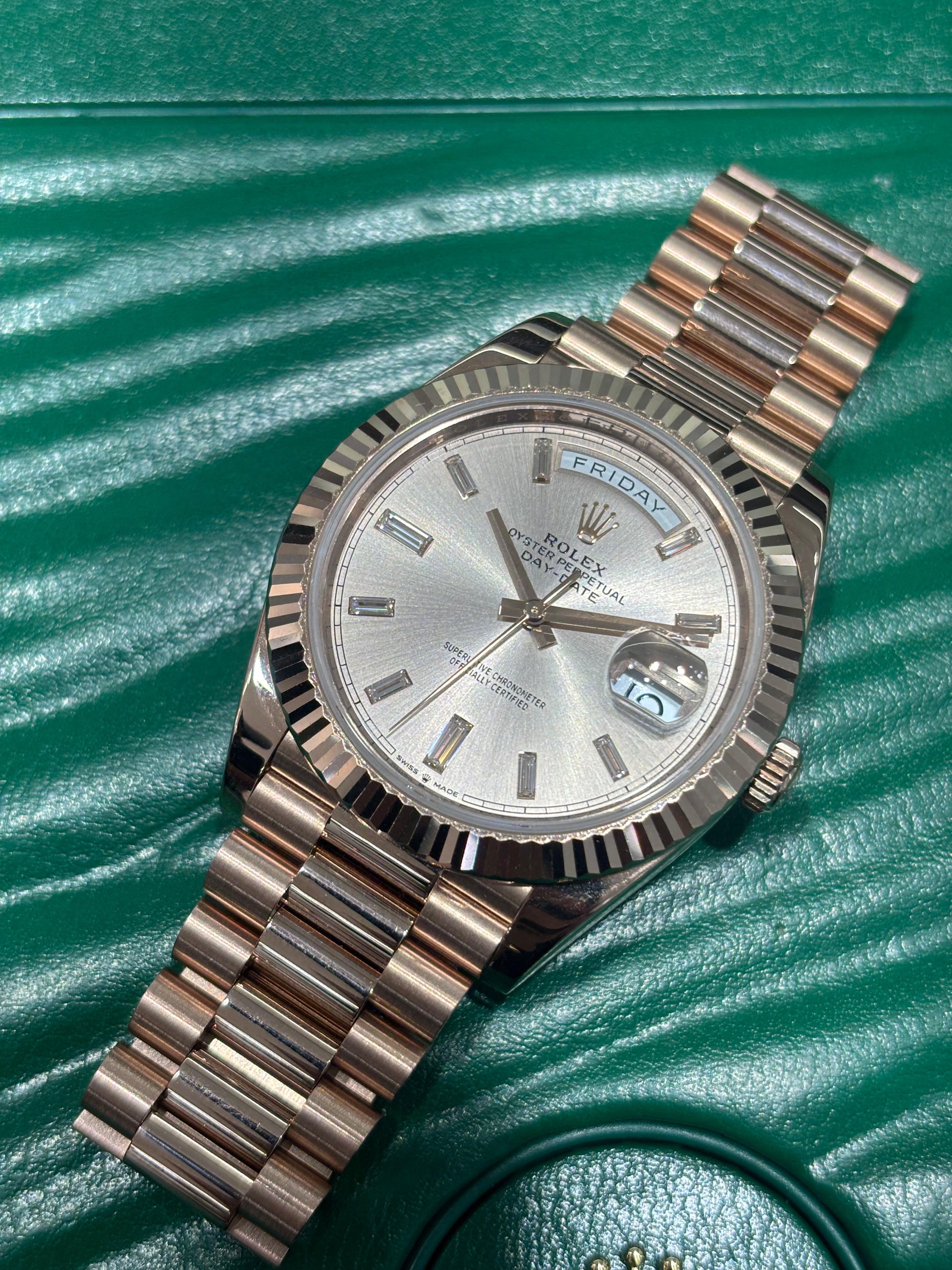 40MM ROLEX DAY-DATE Ref. 228235 | 18KT ROSE GOLD | SUNDUST BAGUETTE DIAL |