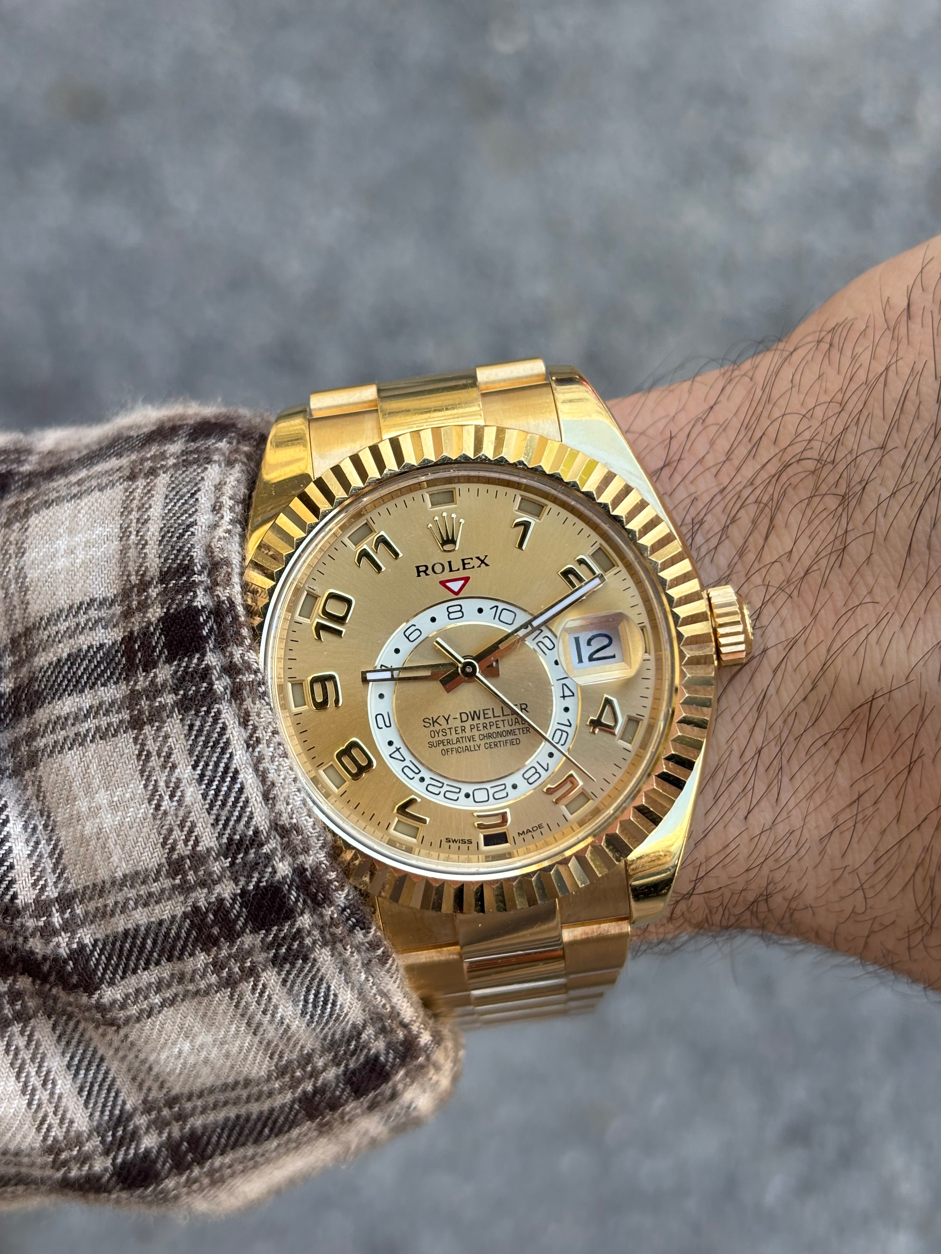 42MM ROLEX SKY-DWELLER | 18KT YELLOW GOLD | OYSTER BRACELET | CHAMPAGNE DIAL