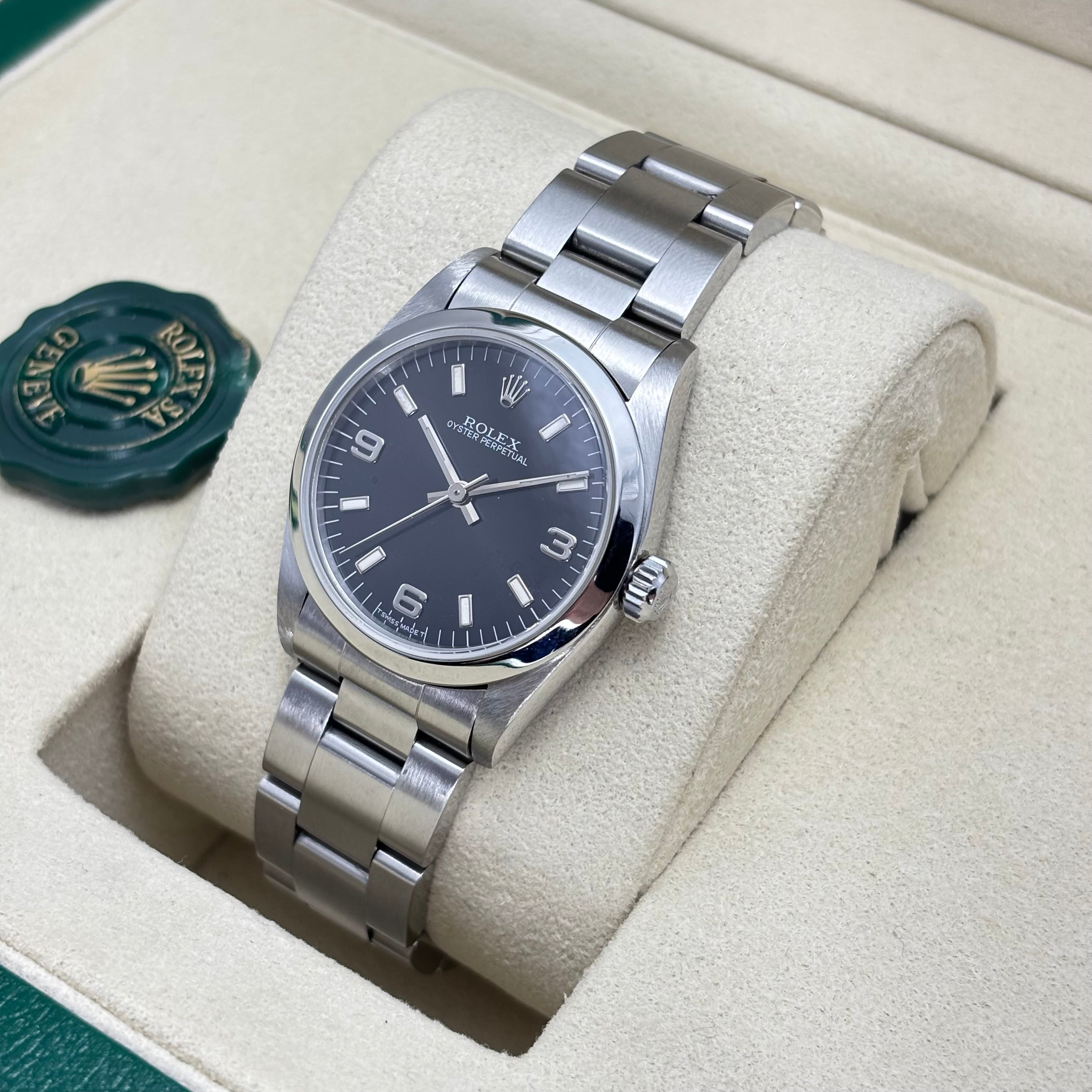 31MM ROLEX OYSTER PERPETUAL “MIDSIZE” BLACK DIAL (NON DATE)