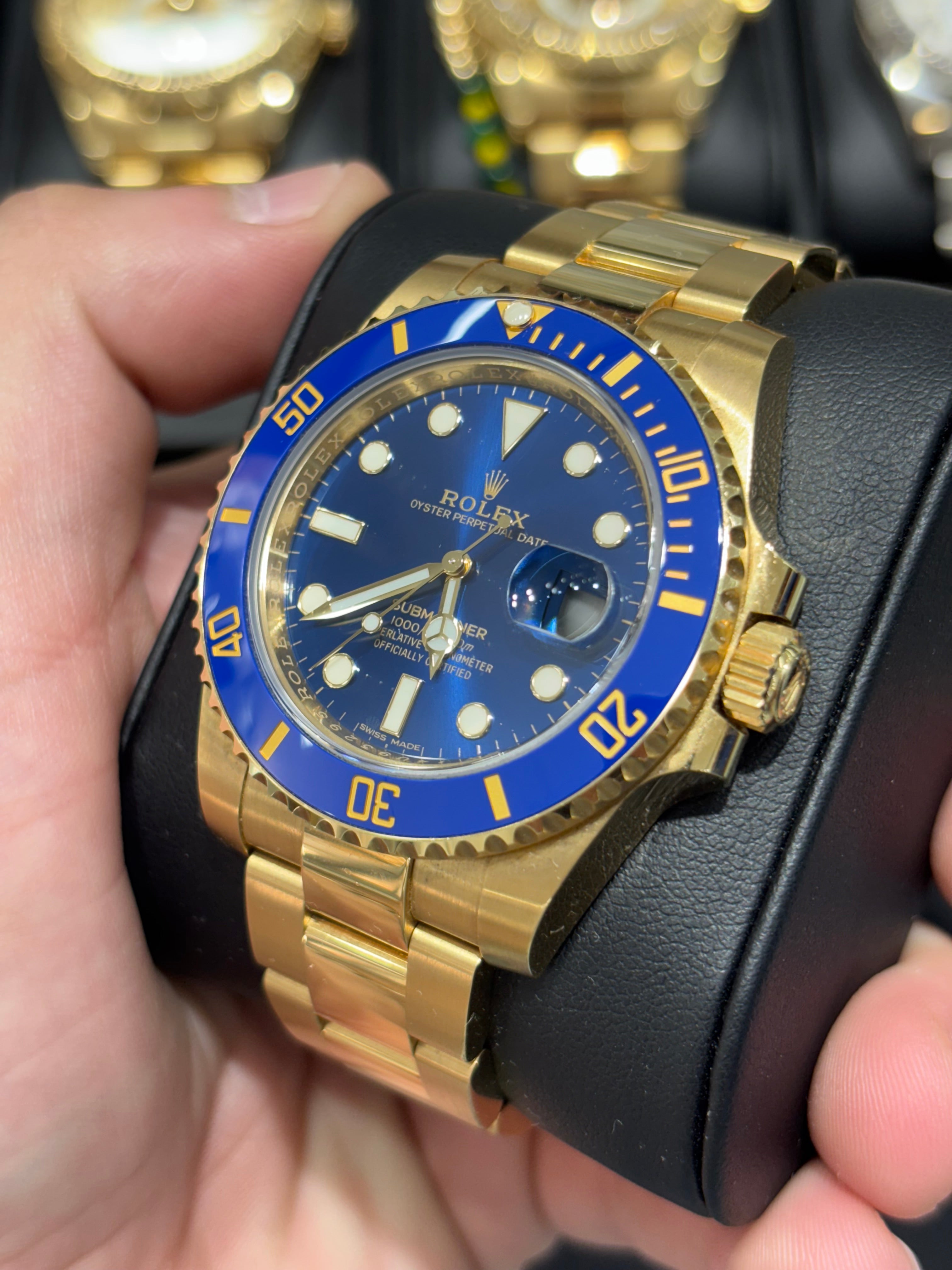 ROLEX SUBMARINER 40MM | 18KT GOLD | OYSTER BRACELET | BLUE DIAL