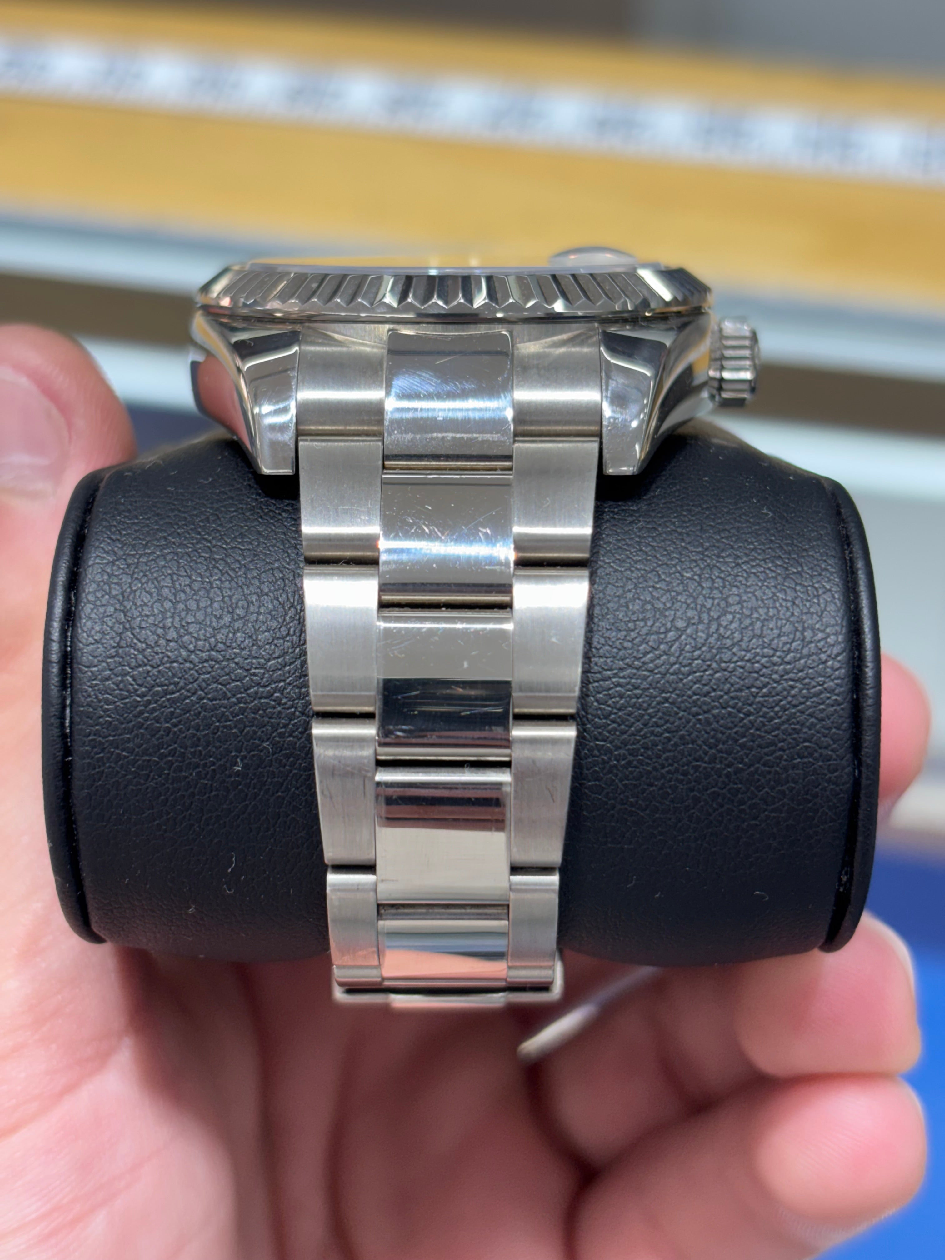 ROLEX SKY-DWELLER 42MM | 18KT WHITE GOLD | OYSTER BRACELET | WHITE DIAL