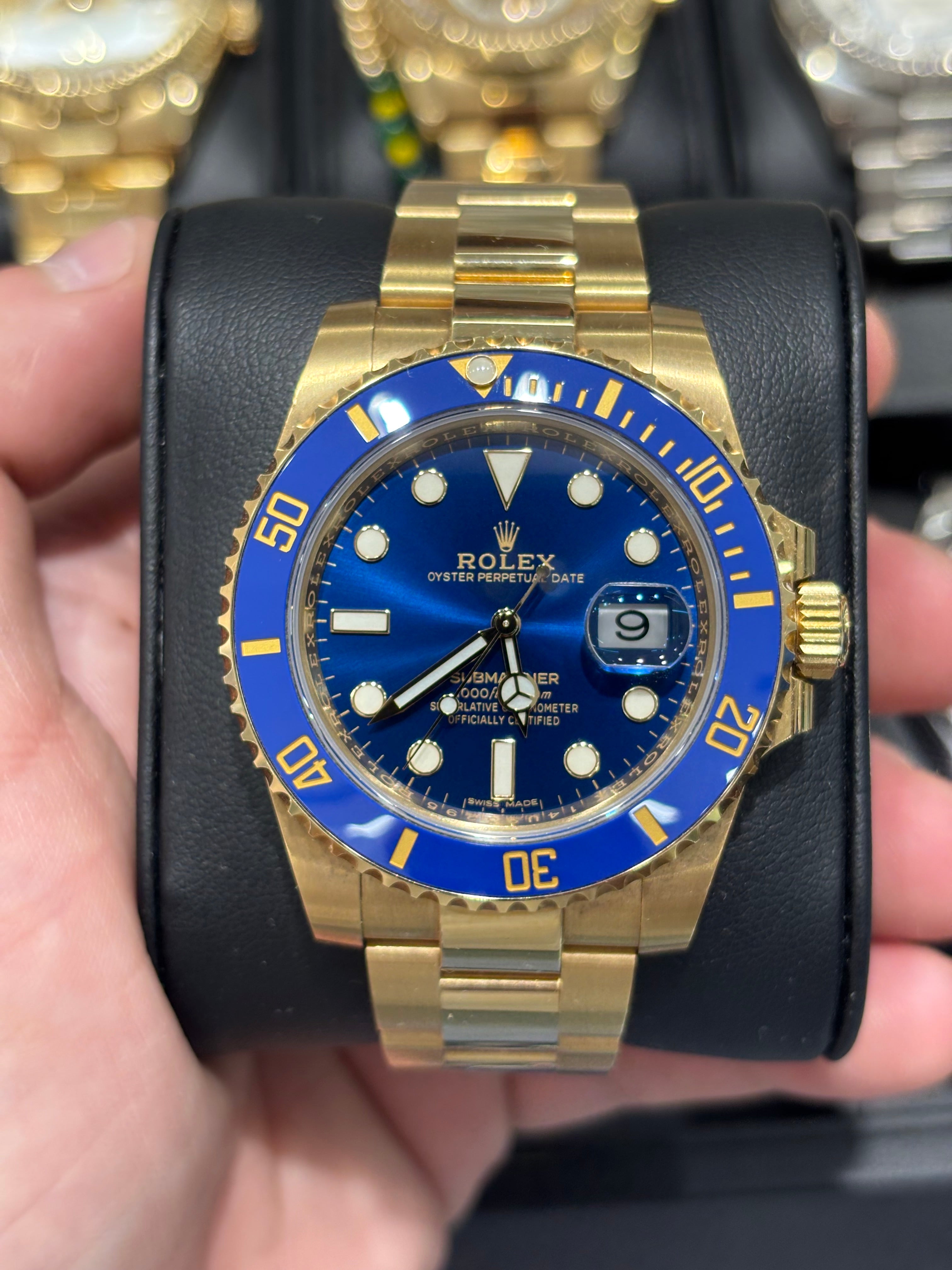 ROLEX SUBMARINER 40MM | 18KT GOLD | OYSTER BRACELET | BLUE DIAL
