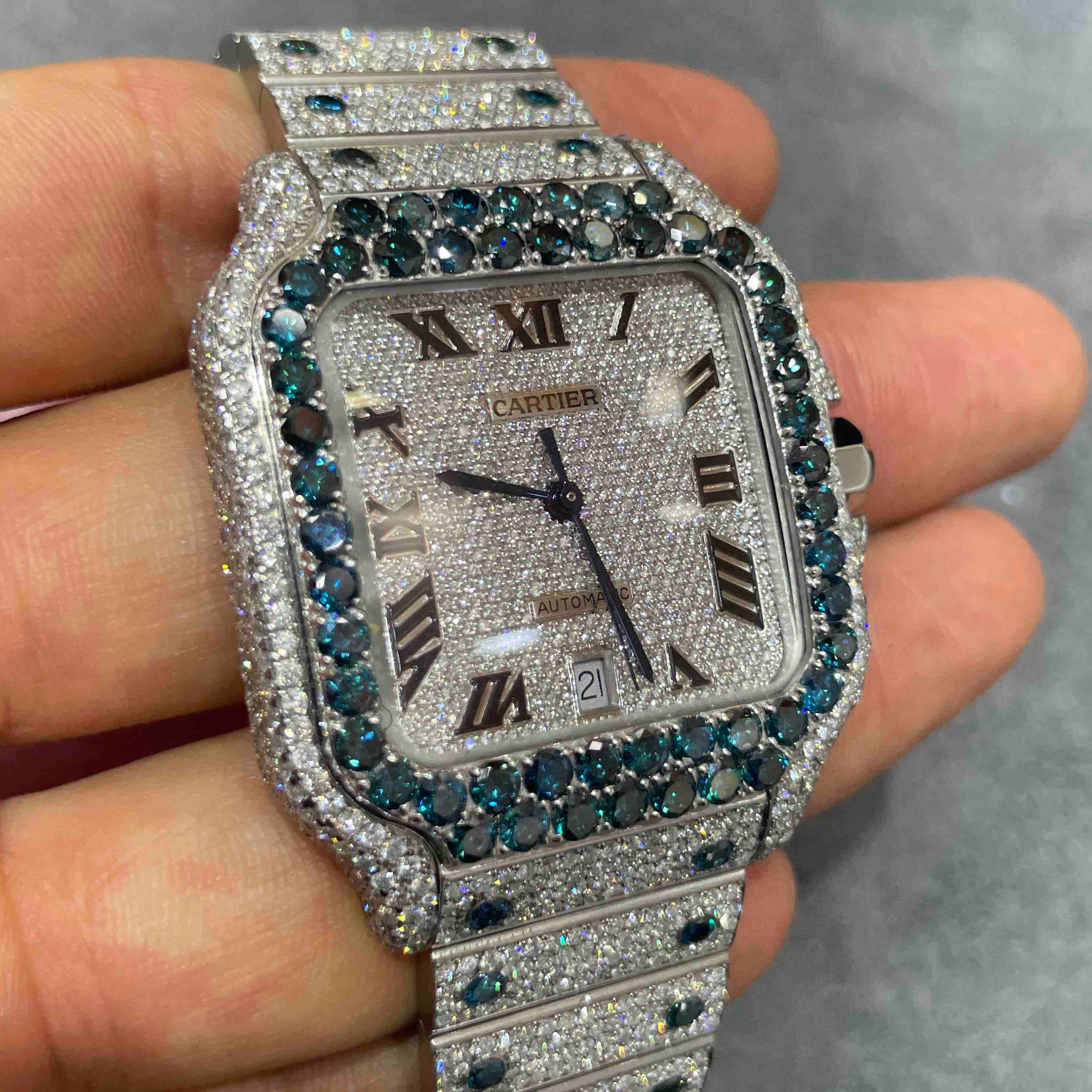 SAPPHIRE ICED OUT CARTIER WATCH