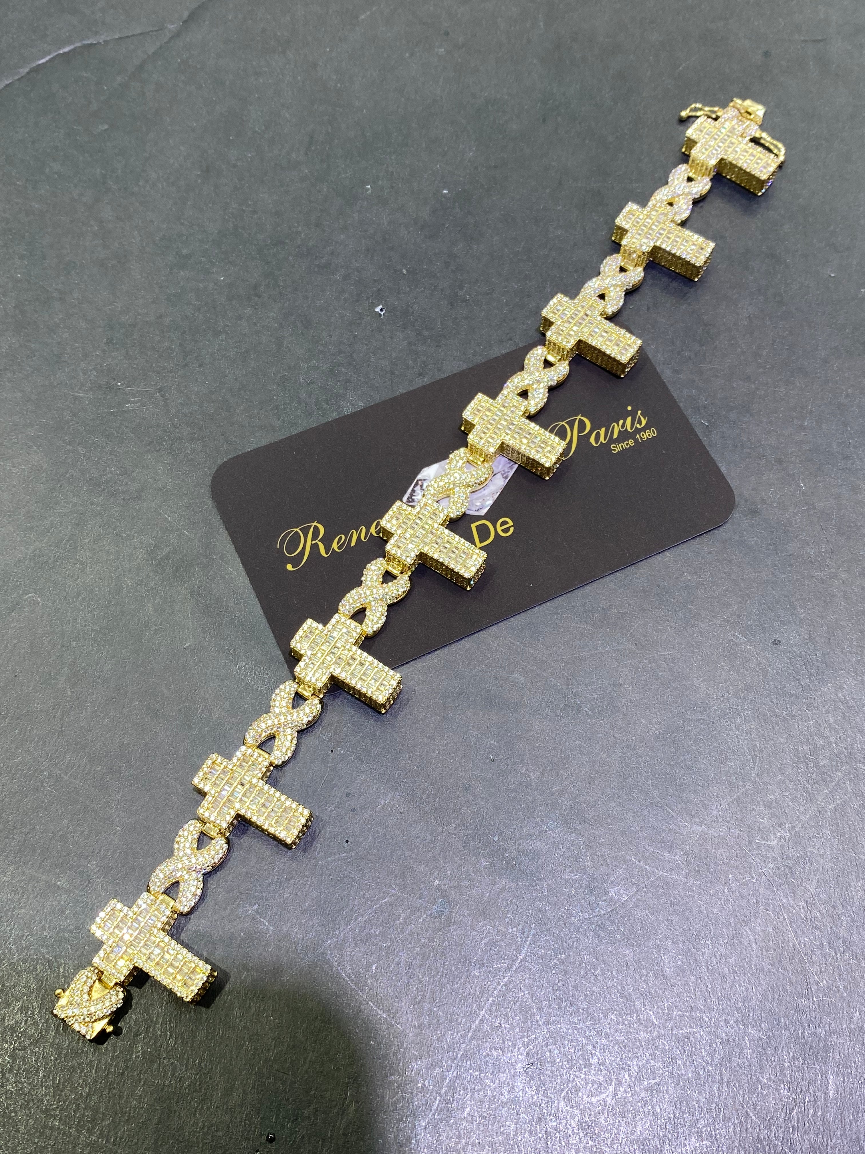 new 10k cross bracelet 38 grams,8.5 mm,czs(not diamonds)